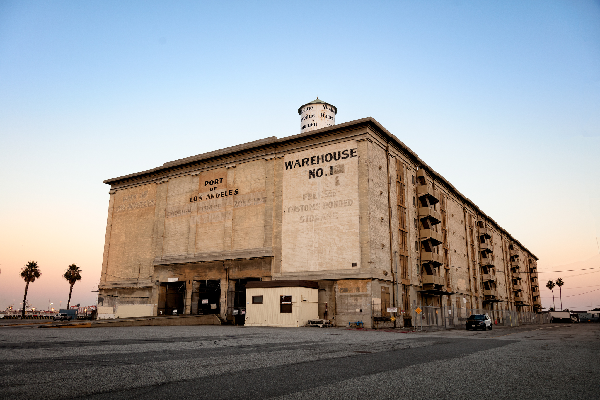 This antique warehouse with the lonely police cruiser parked beside it seemed full of feeling for a building, and told me a complicated story. I simplified the composition as much as I could, and elected not to correct the perspective to preserve the sense of scale. By the way, the cop got irritated with me after awhile and left.