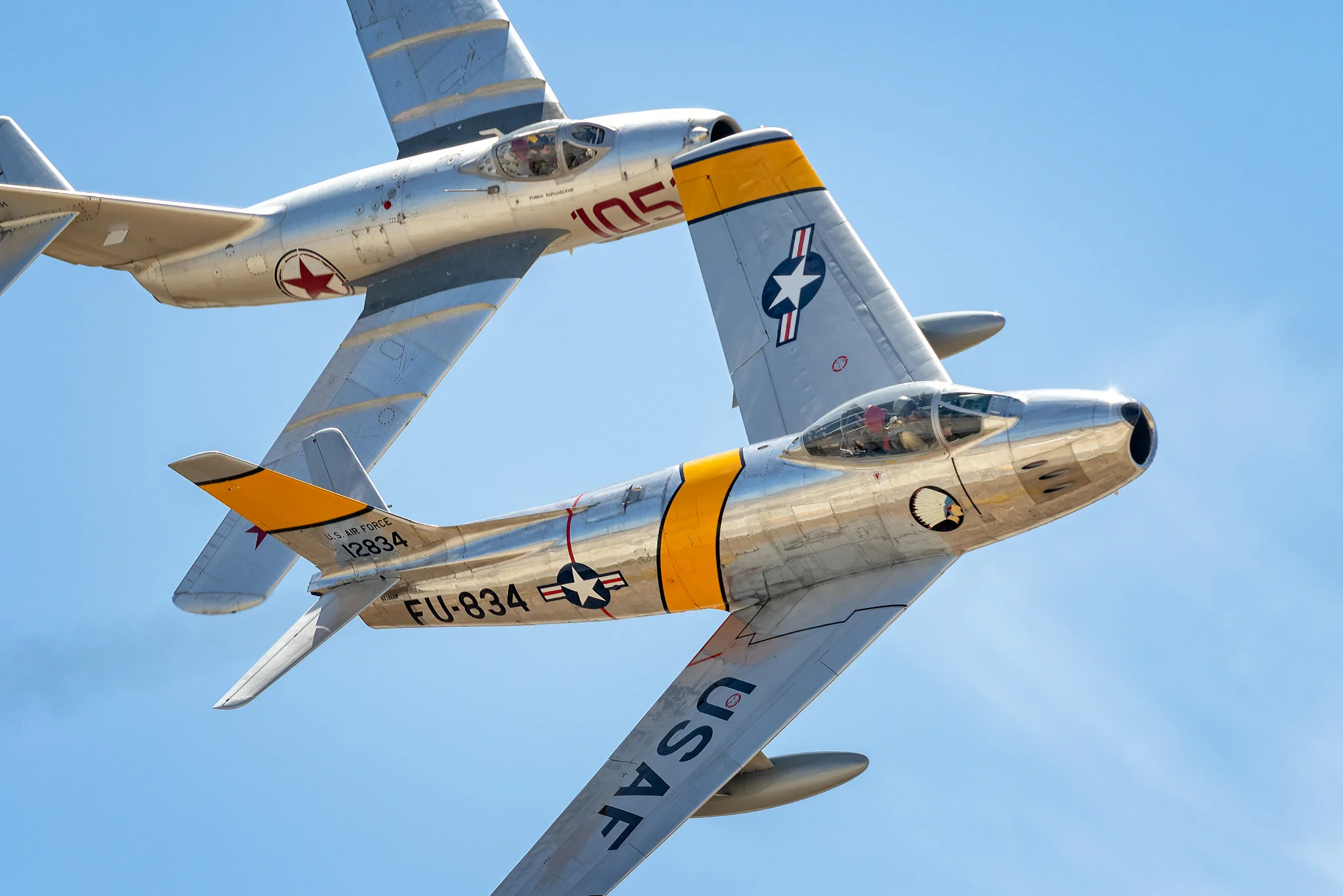 An F-86 and a Mig 15 vie for air superiority