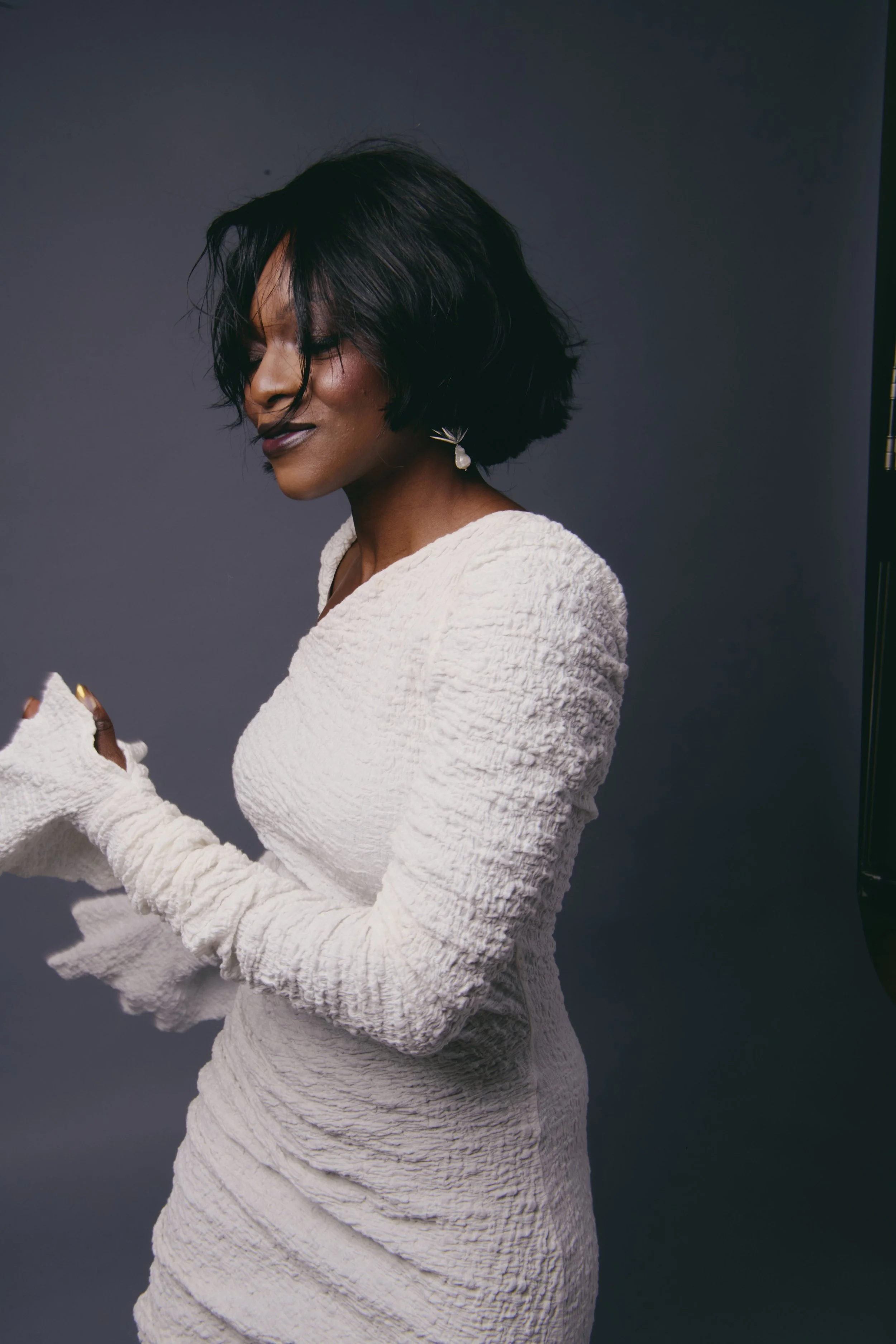 adeola wht dr 3earrings.jpeg