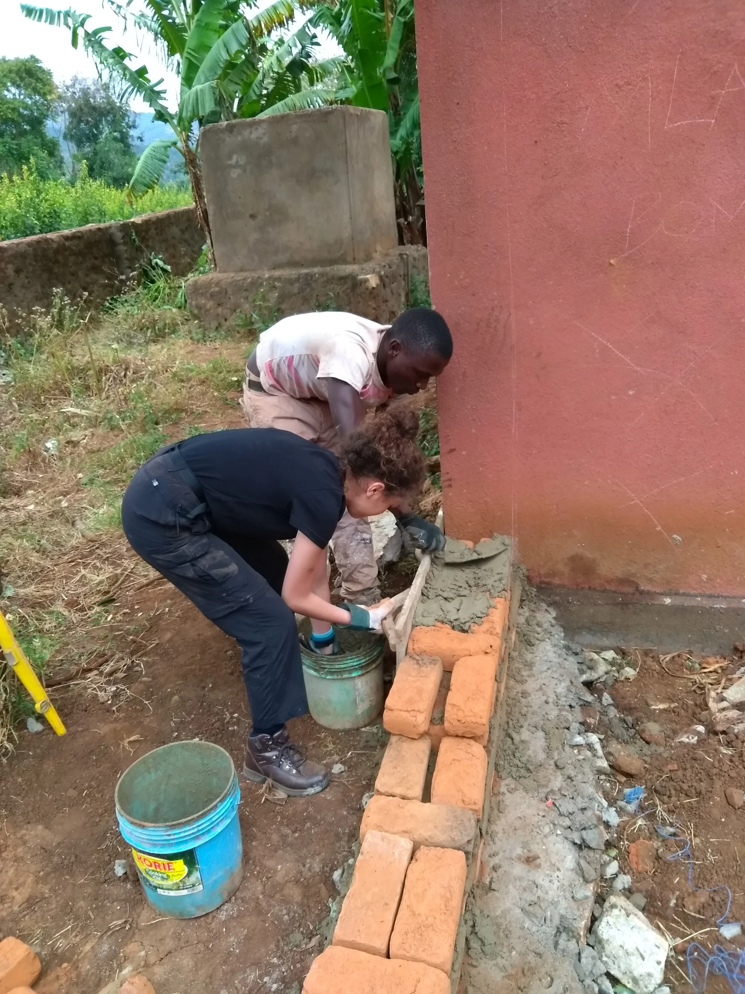Learning skills along side local builders and adding value