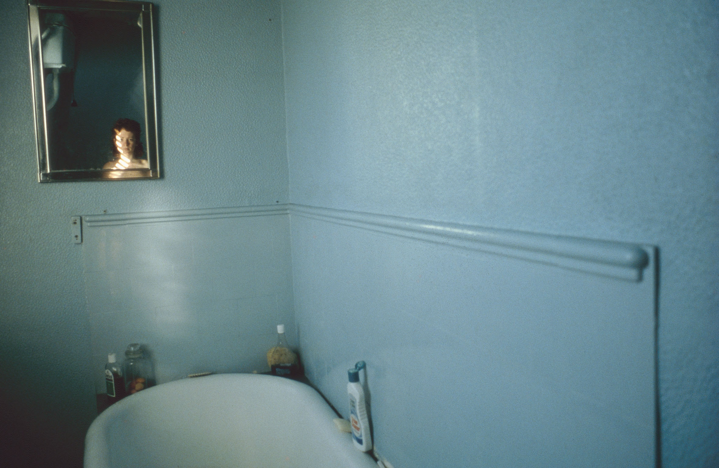 Nan Goldin, Self Portrait in the Blue Bathroom, London, 1980