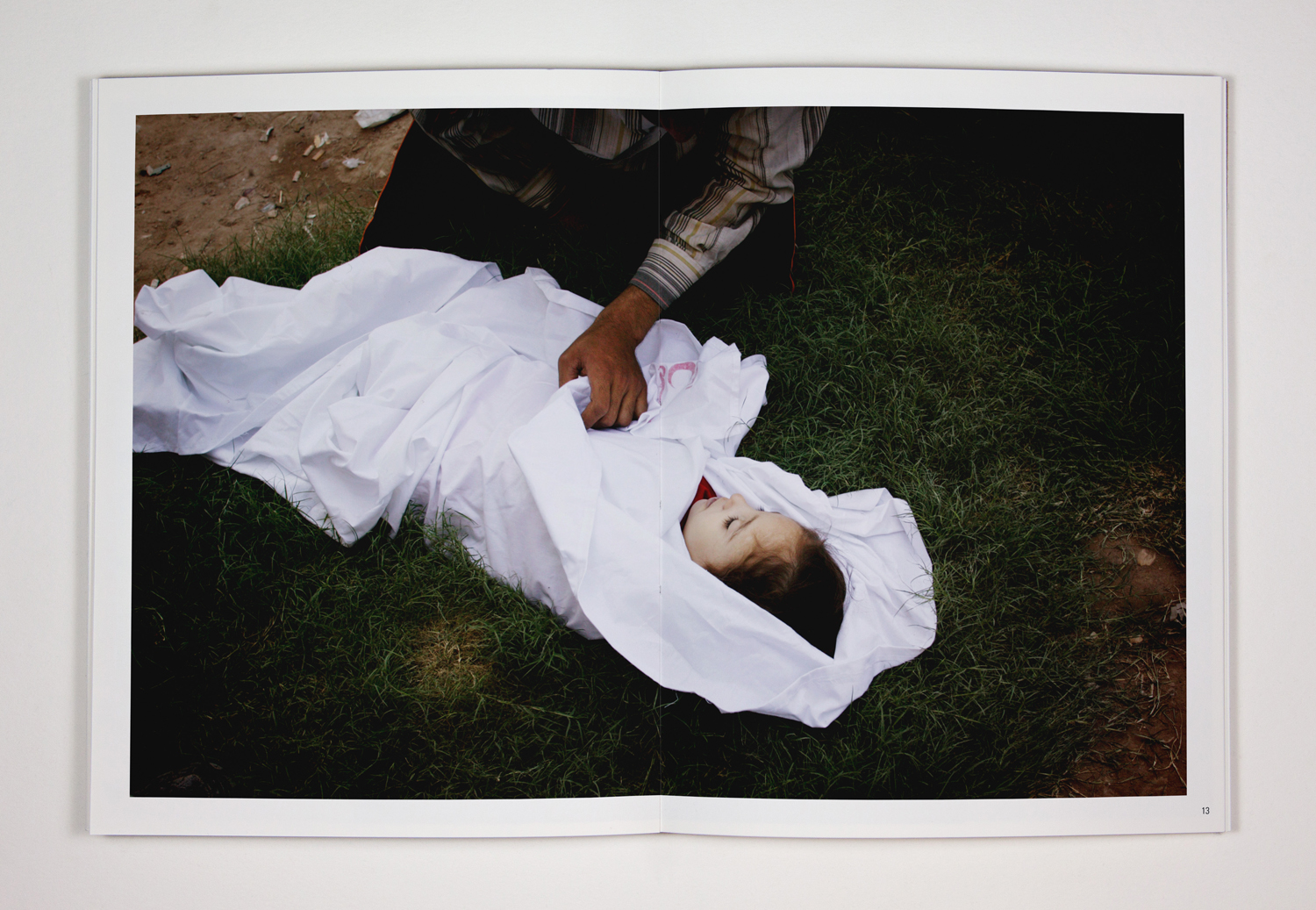 31. A young girl named Sahra was among the victims of the Kadhimiya stampede. An uncle stayed with the dead child while her father went searching for his wife – her mother – who was still missing. 31. Aug 2005. Baghdad, Iraq