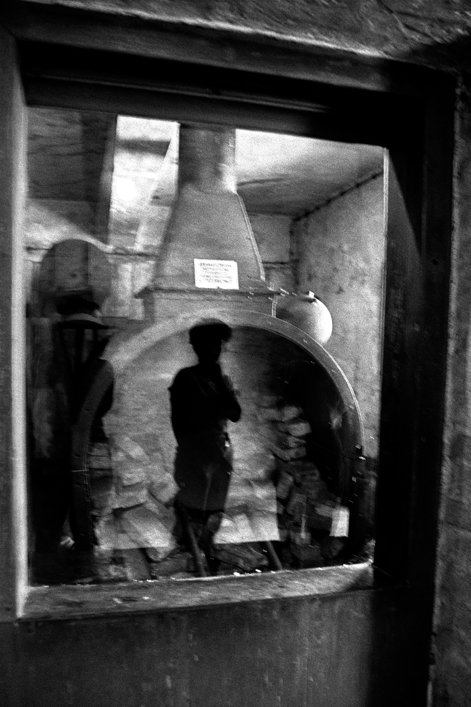 Reflection of Woman Viewing Oven