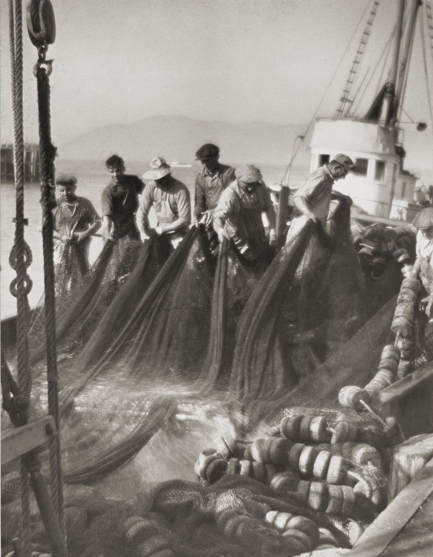 Washing their nets at Fisherman's Wharf