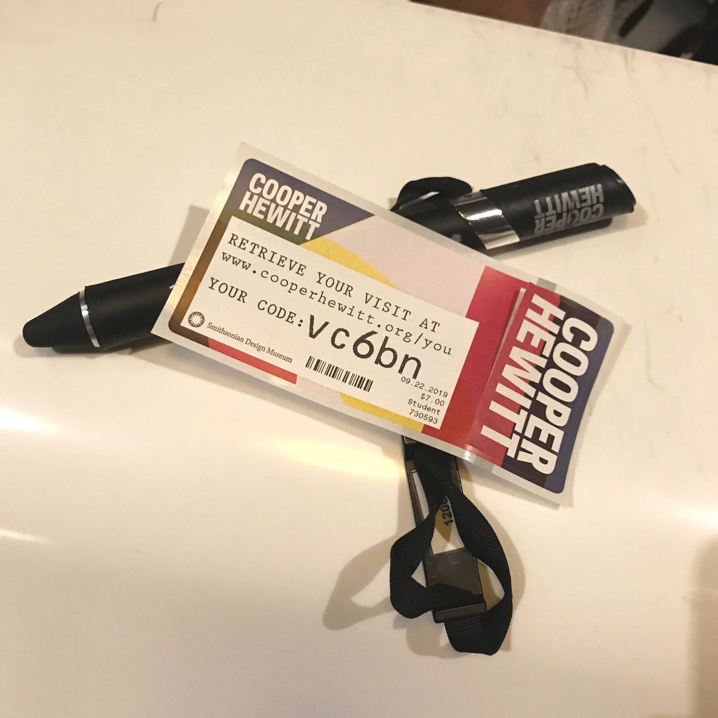 Ticket with the code - suggested the affordance of the pen