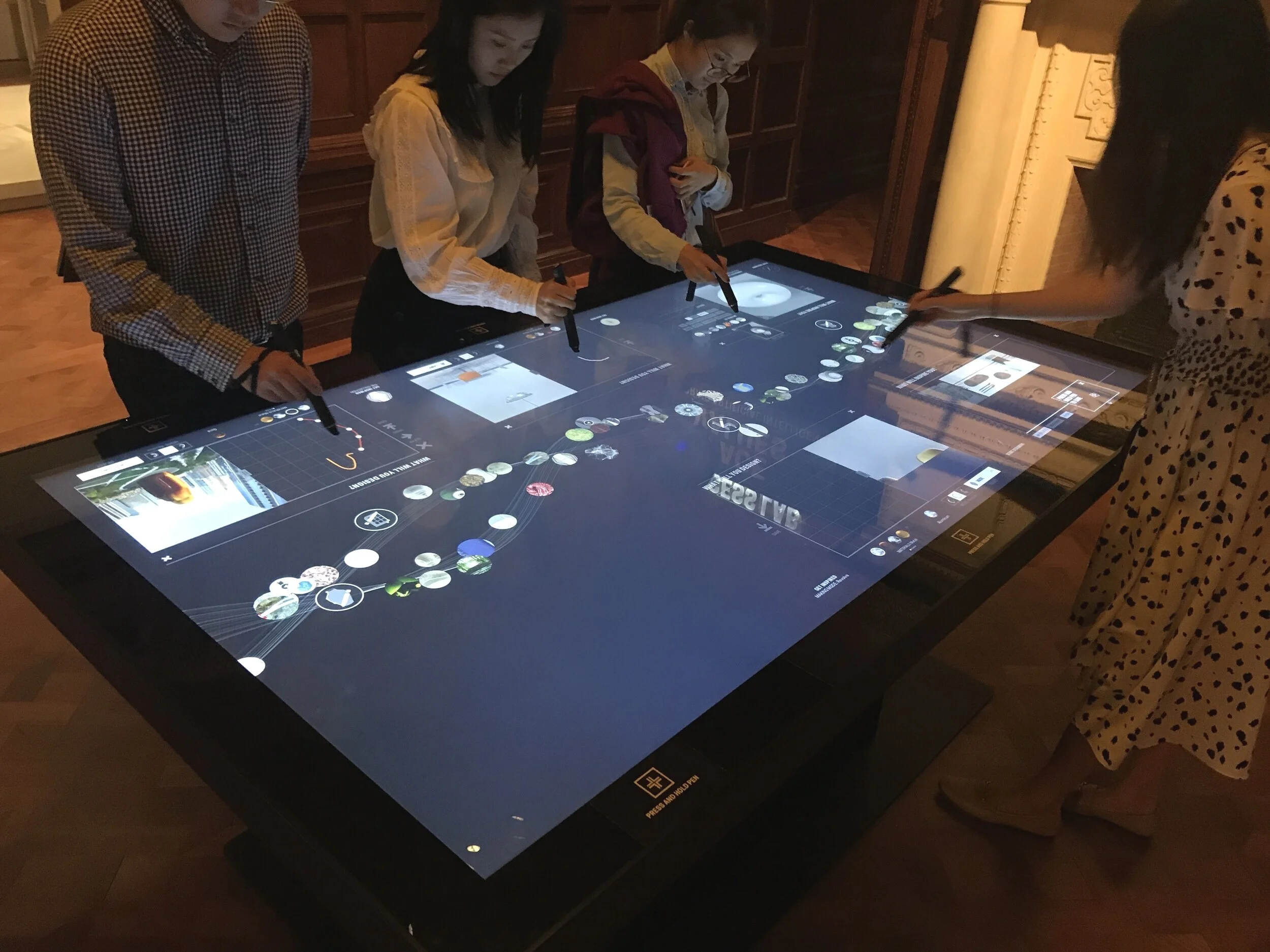 the interactive table act as a informative station for overall exhibition, also as a part of the mapping design for the pen as an information collecting device
