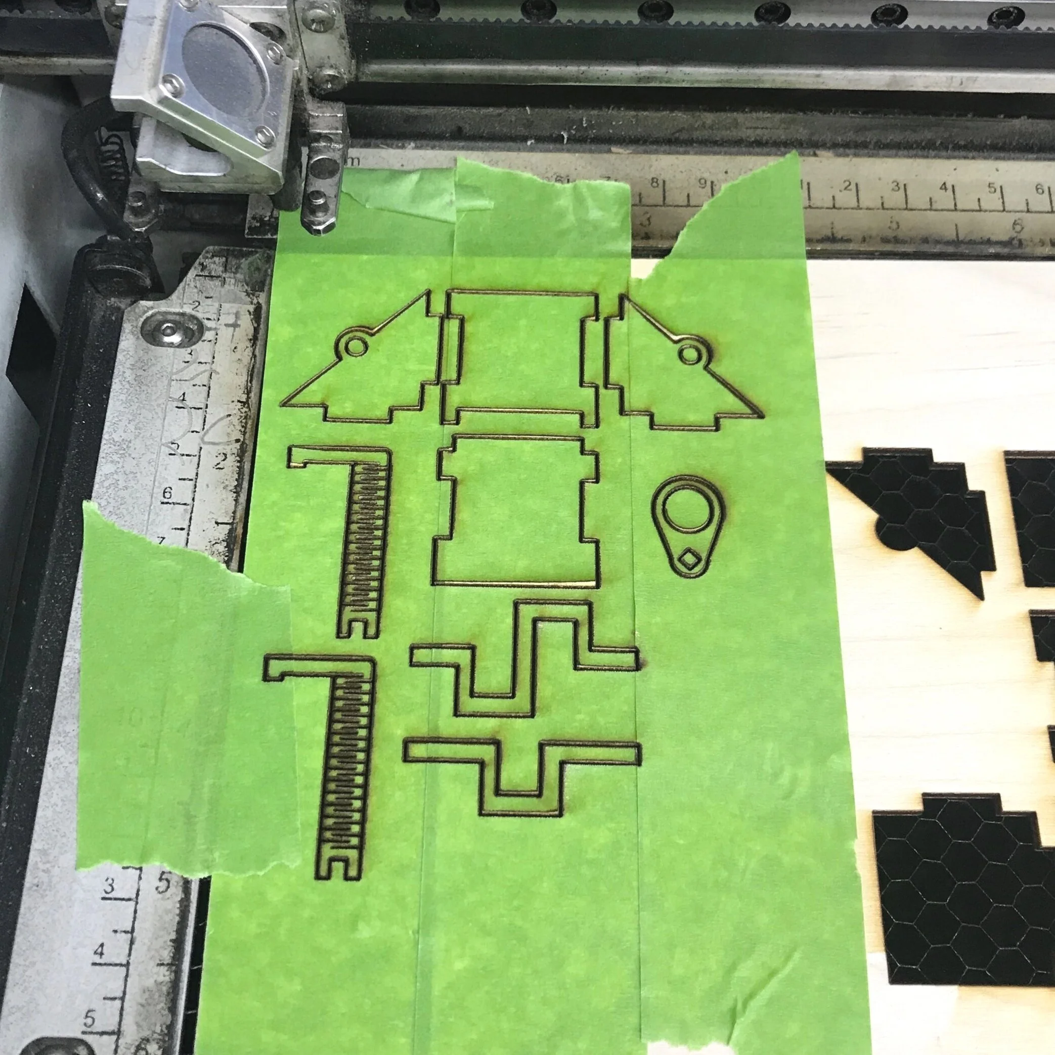 Cover the wood with the paper tape before cutting