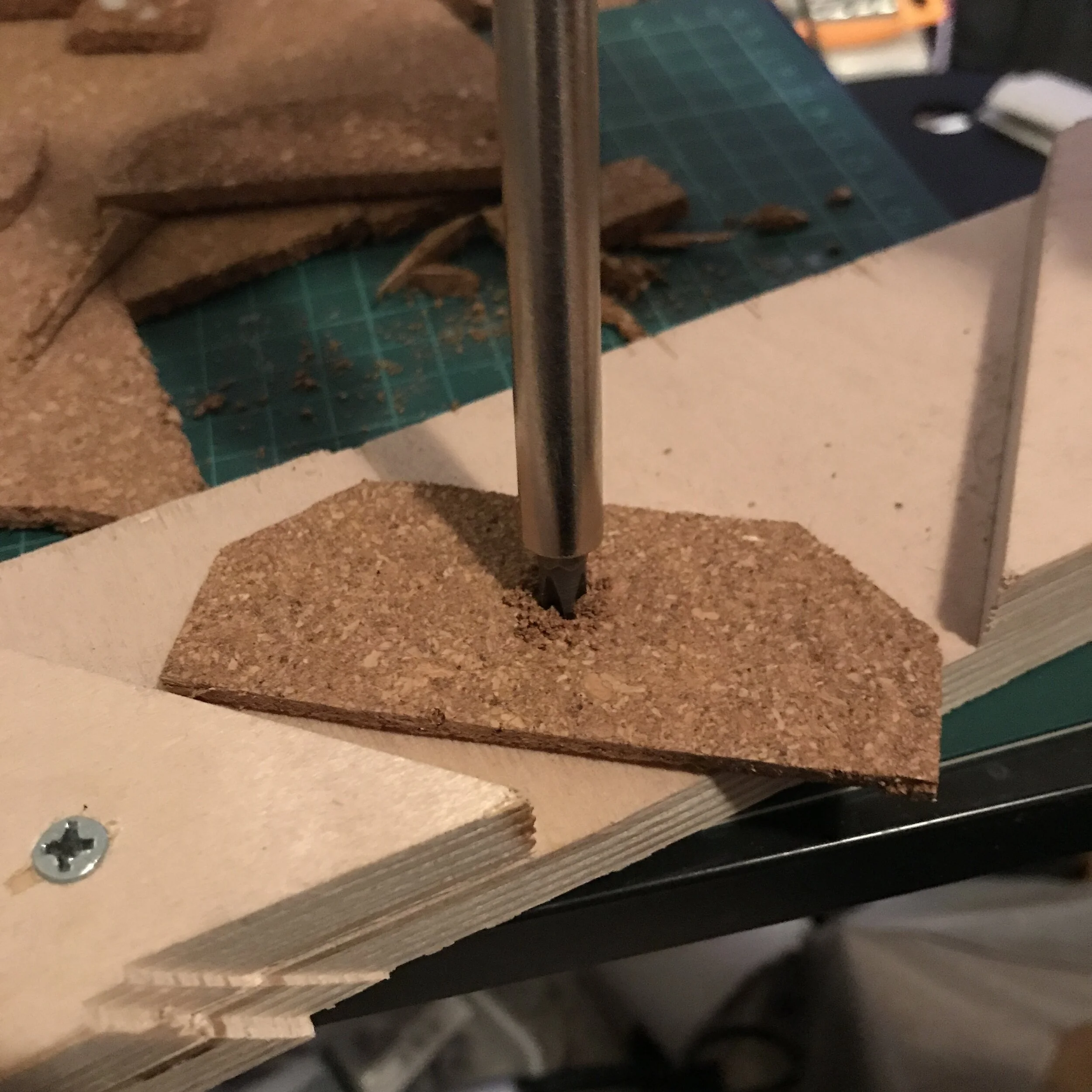 cork is pretty hard to cut out the small- precise holes since it’s pretty crumble