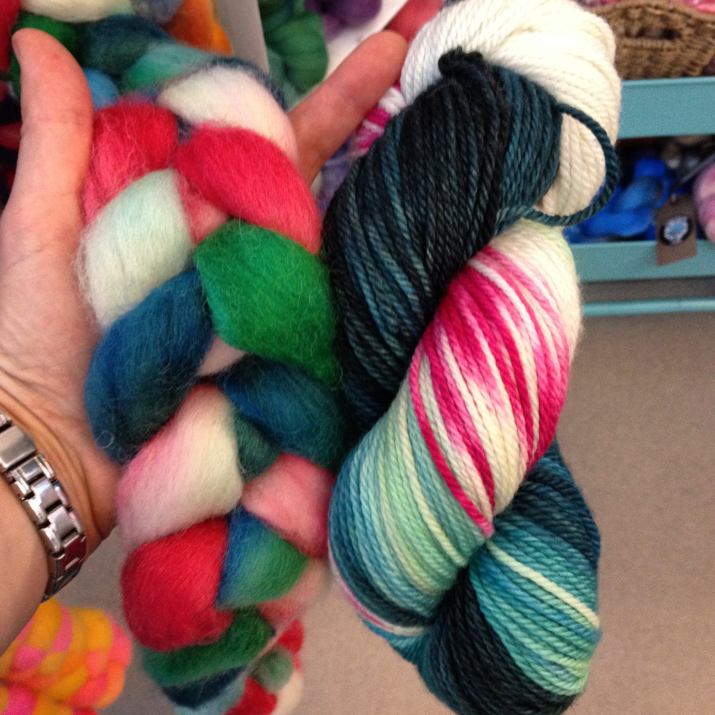 On the left, Porpoise Fur Holly Walk on Romney; on the right, Third Vault Yarns The Magpie on superwash Merino Aran weight squooshtastic yarn.