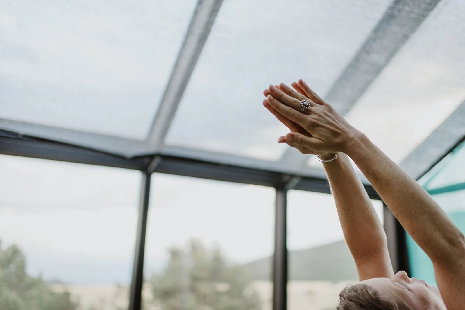 Chanda reaches to the sky in Sun Salutation