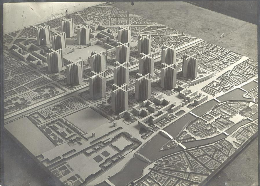 Modernist architect Le Corbusier's 1922 proposal to destroy 2 square miles in the center of Paris and replace them with high-rise apartment towers fronted with parking lots and connected by highways.