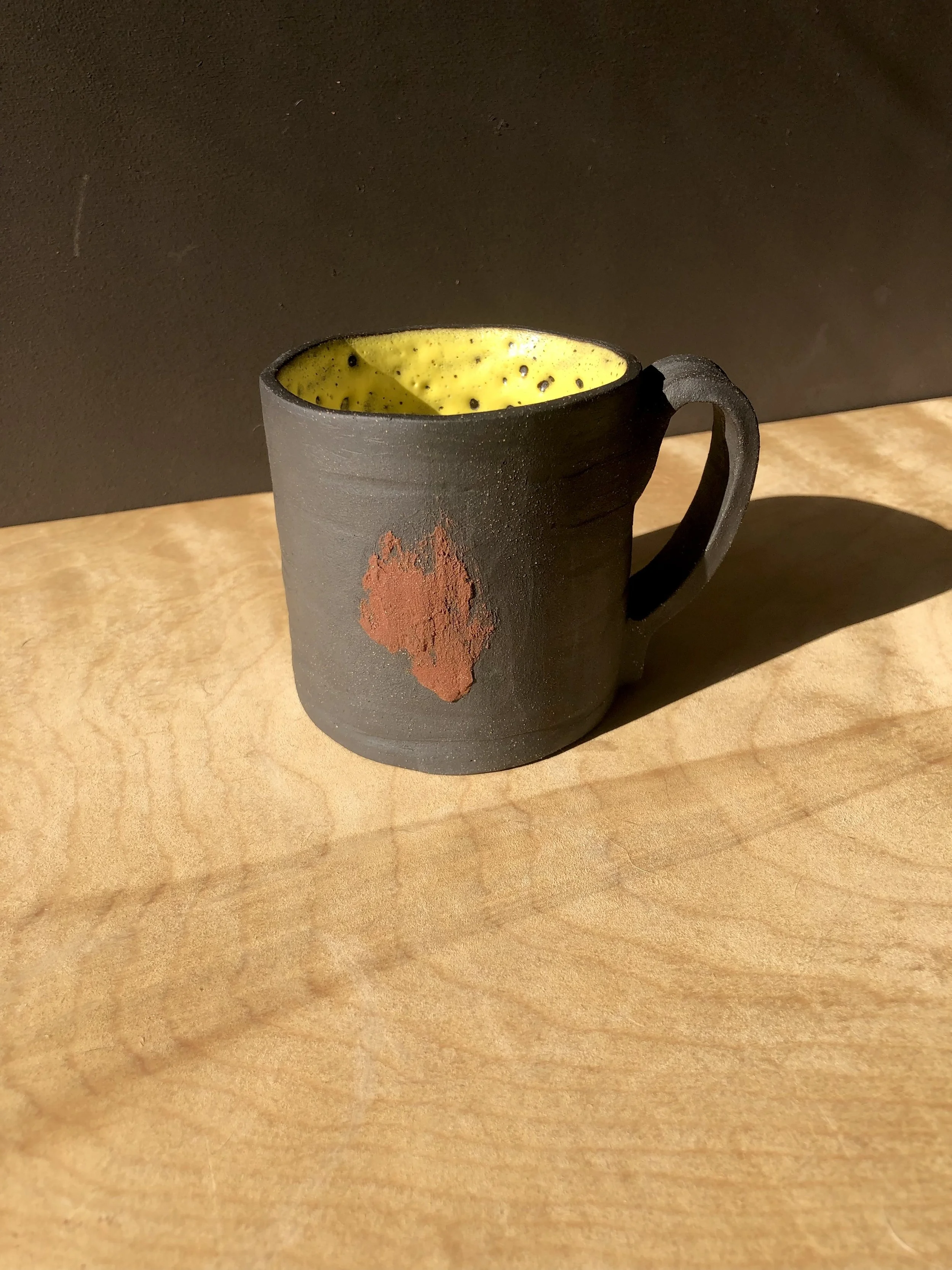 black and yellow fire mug.jpeg