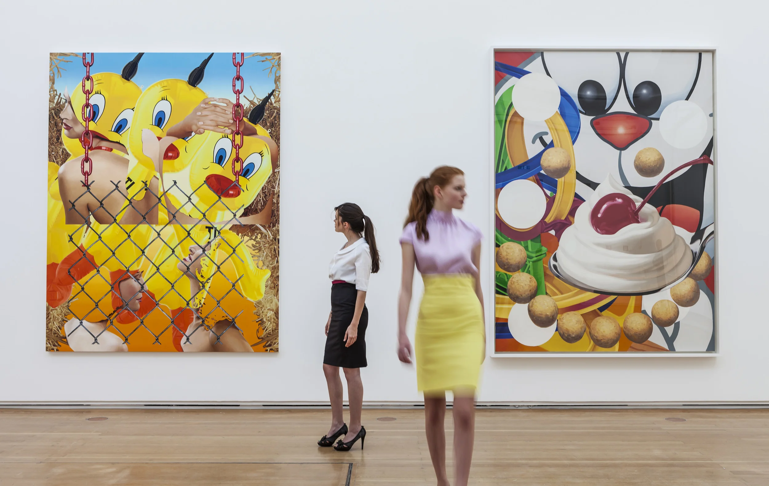 Carefully posed art babes respond to Koons paintings. Or don't.