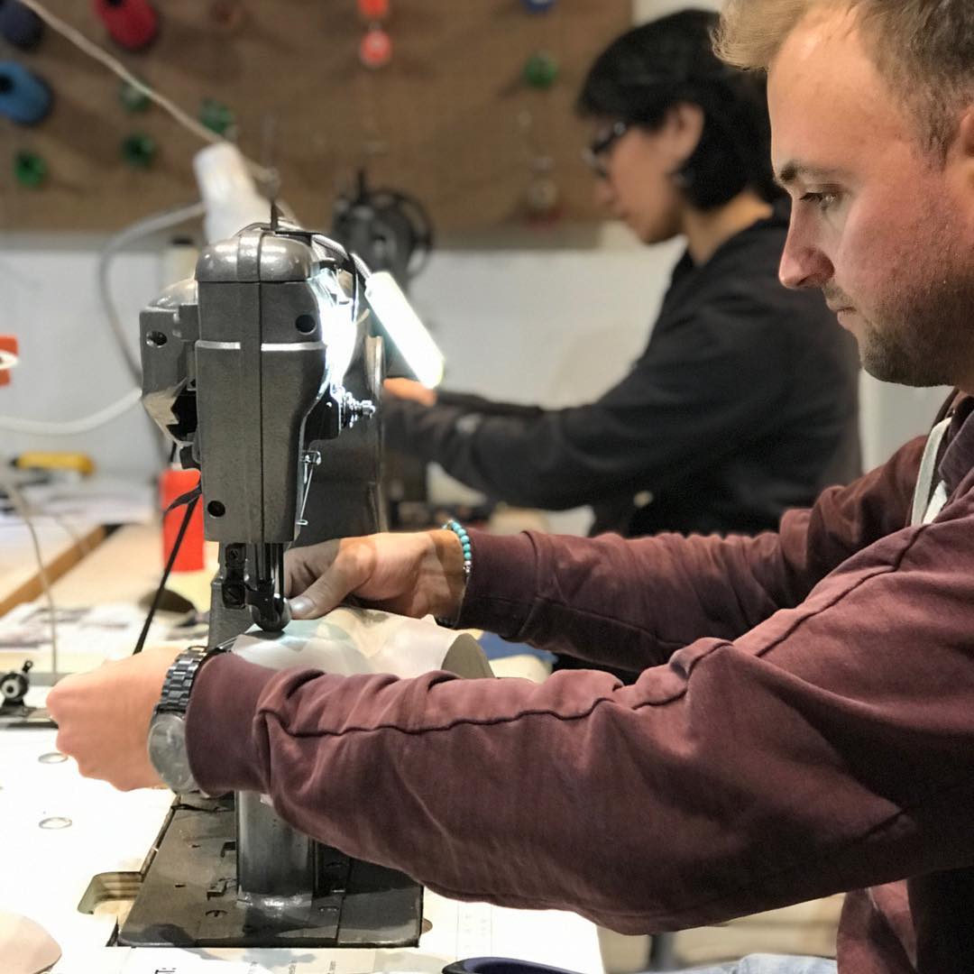 Sewing leather uppers on industrial sewing machines. Photo by BSS.