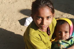  Parul holding a baby