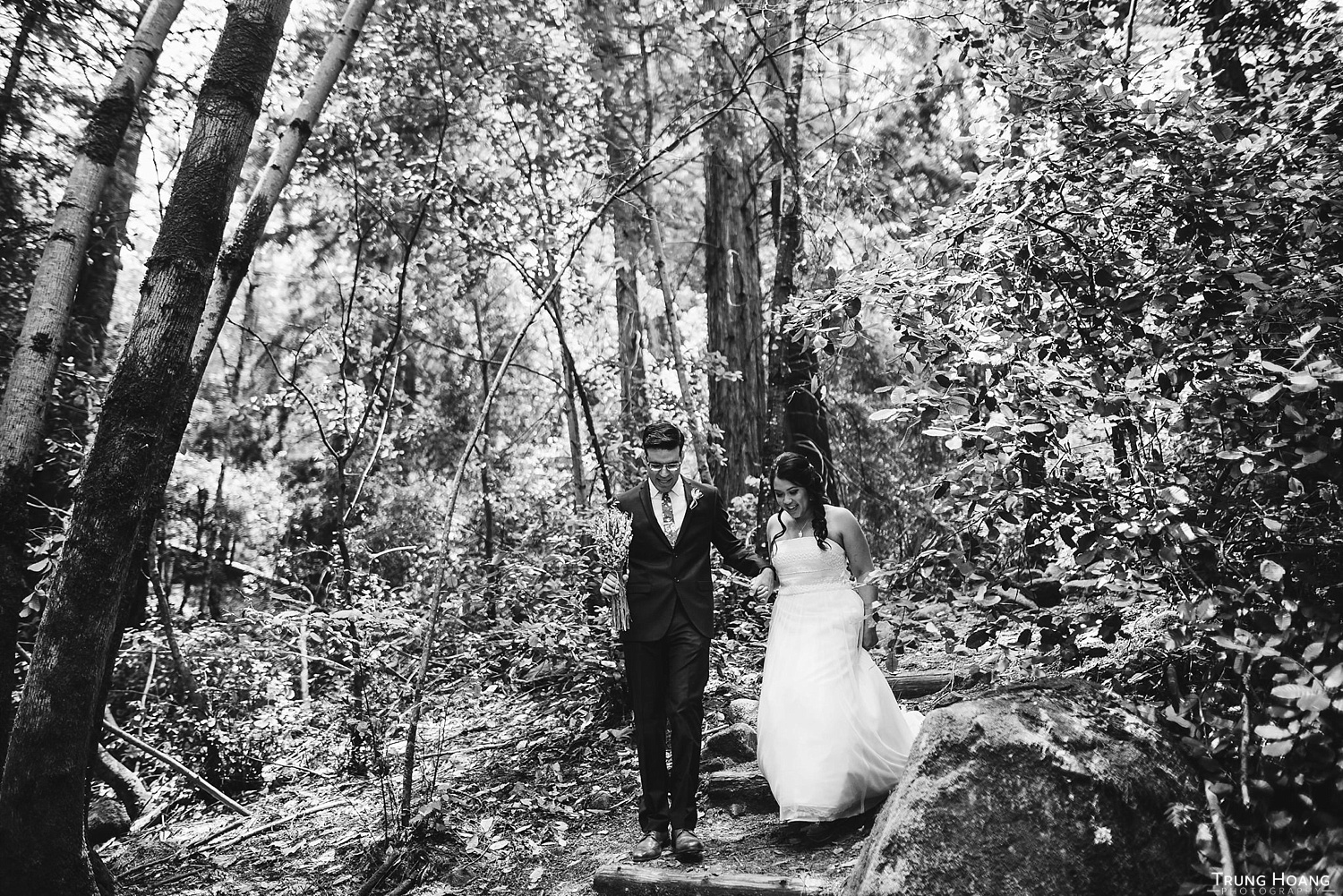 Walking through the forest wedding portrait