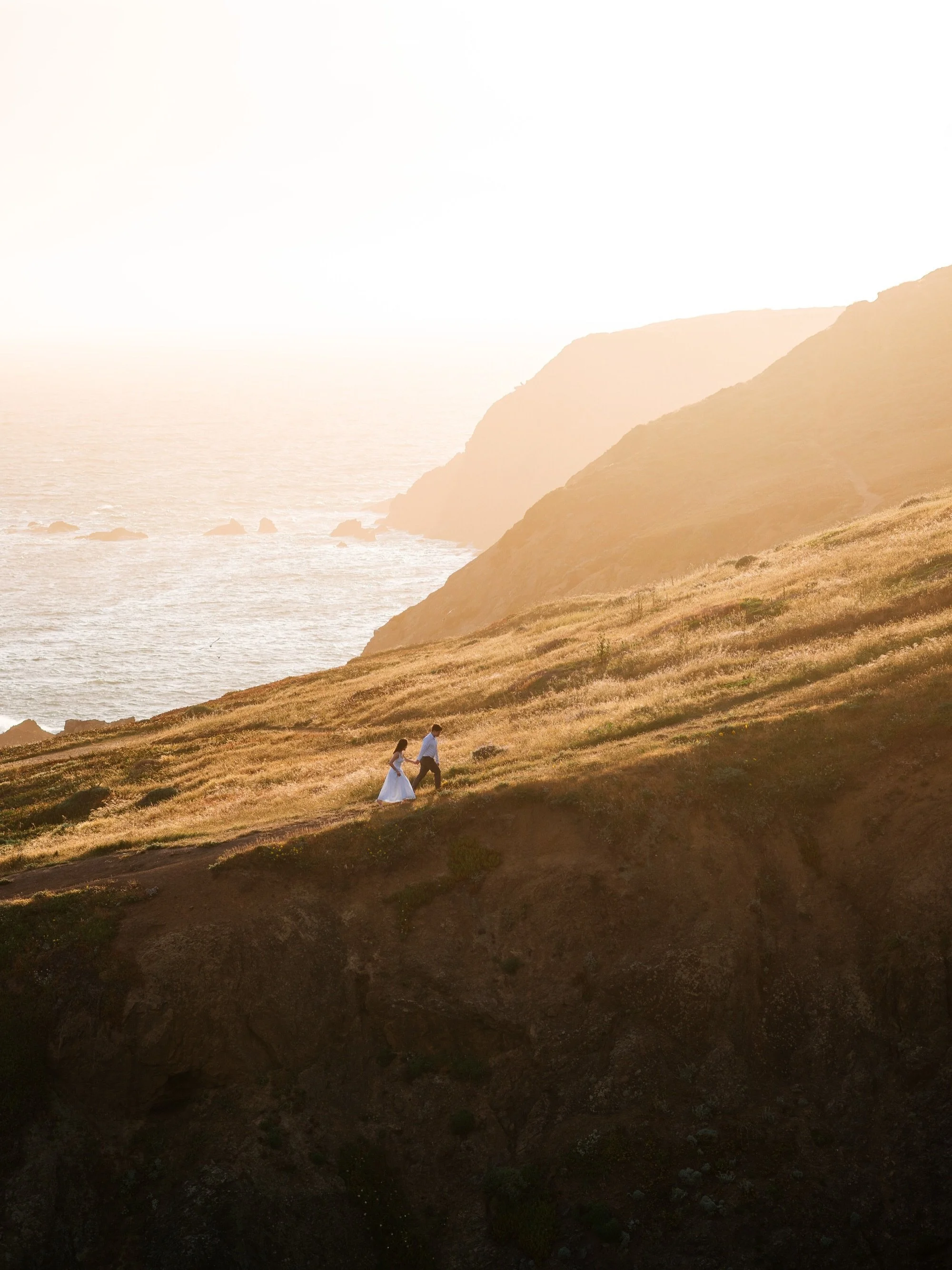 I love photographing a big landscape. I also love photographing people. Naturally, I love photographing a big landscape with people. 

It rained today so here are some photos from a sunny engagement session in one of my favorite places, the Marin Hea