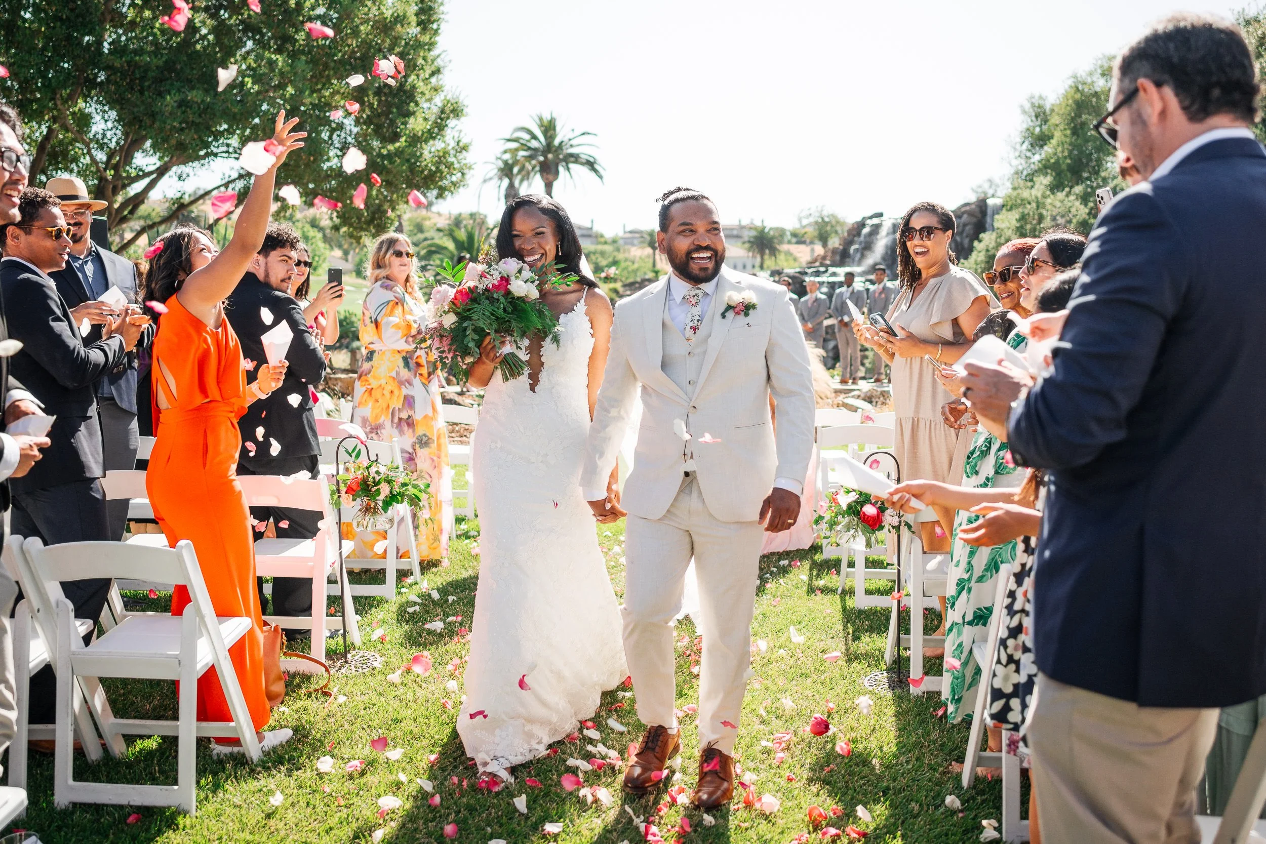 Happy couple recessing after ceremony at the Silver Creek Country Club