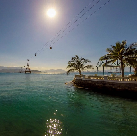 "View of the Nha Trang from Vinh Nguyen Island. The cable cars take you from the mainland onto Vinh Nguyan Island where there is a huge waterpark and resorts. If you look closely, you can see Nha Trang's skyline in the distance"