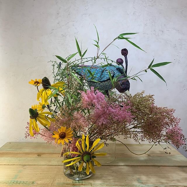 Django @ickybana was playing with left over flowers from the week in the shop on a quiet Sunday and created this image with one of the birds. We grew the flowers in the yard and added some foraged grasses.  #magical