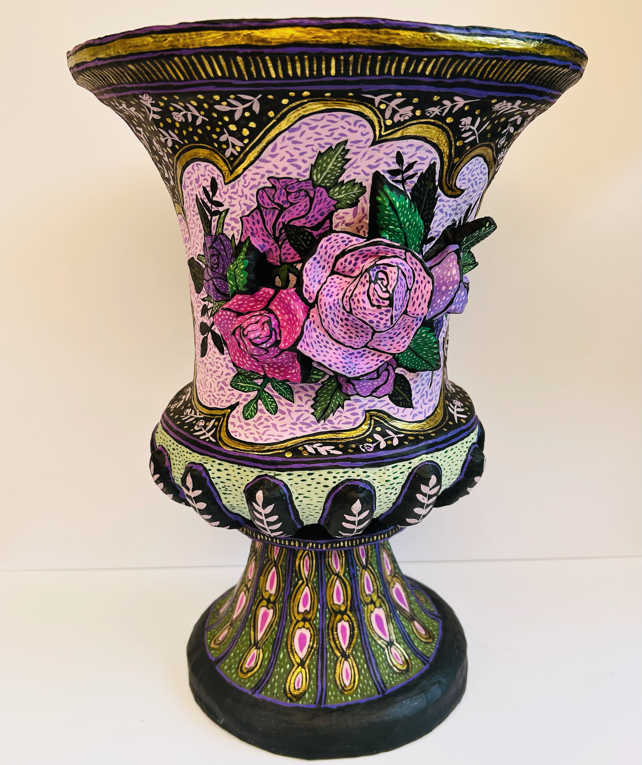 Paper mache urn with relief florals 