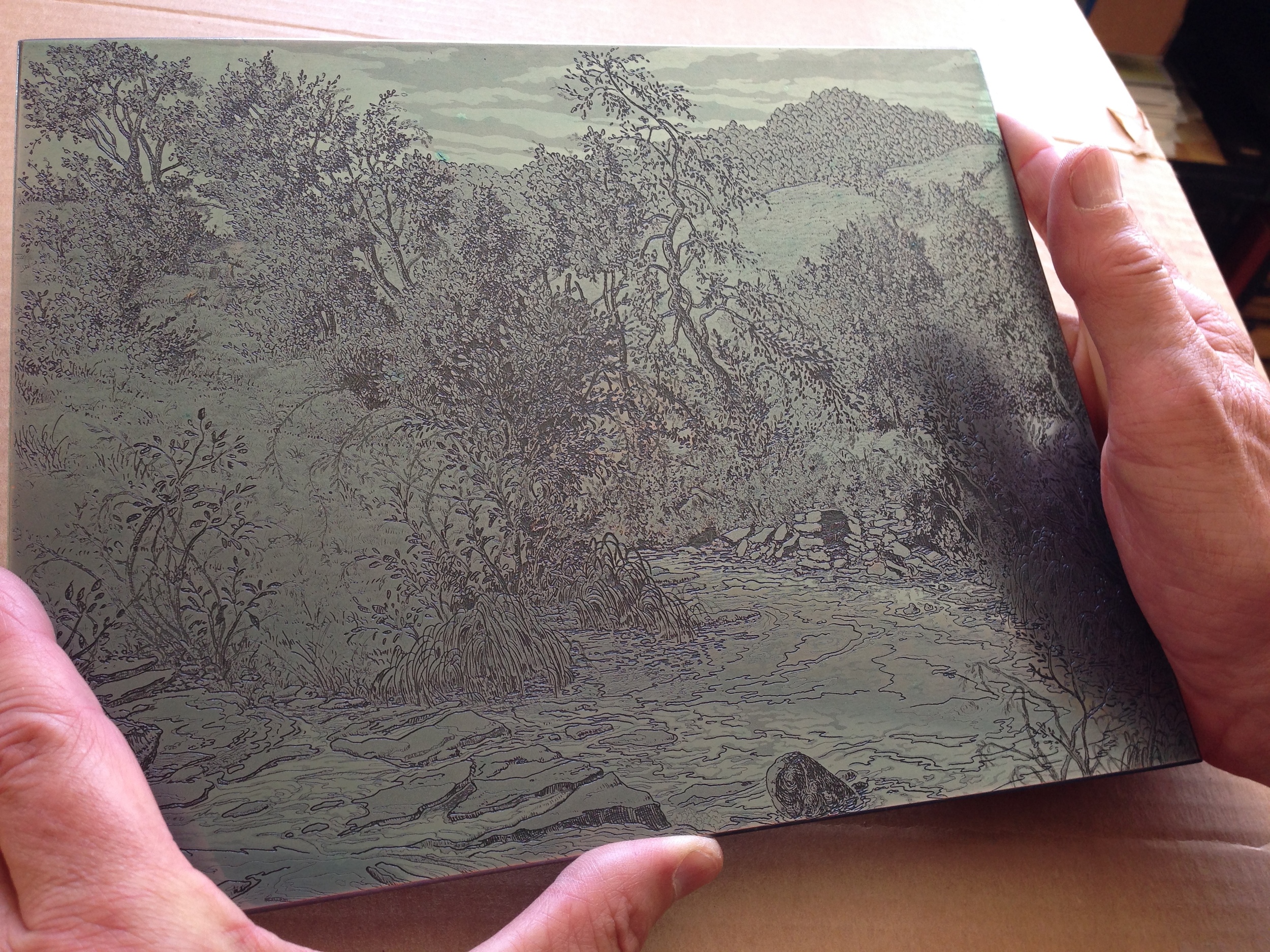 The completed copper plate has been steel faced and is ready for final proofing and editioning.