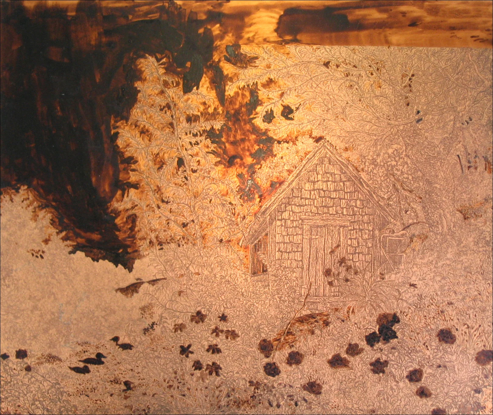 The dark material on this plate is a stop-out ground that prevents acid from biting certain areas of the plate.