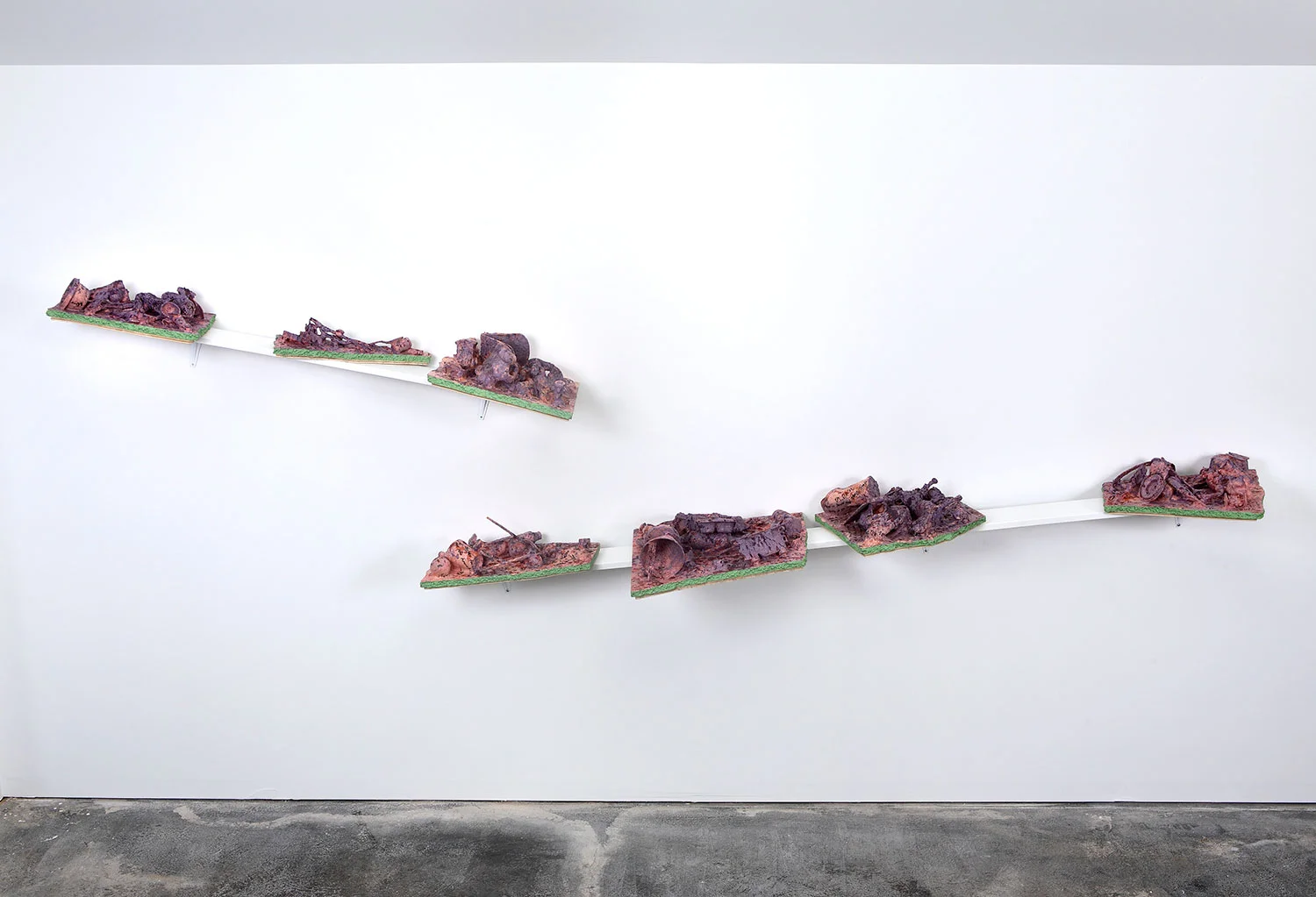 Lost / Found 2011, 6’x11’x1.5’ Installation: plastic toys/objects, styrofoam sheet, abaca fiber, natural dyes (madder & logwood), paints, and wax