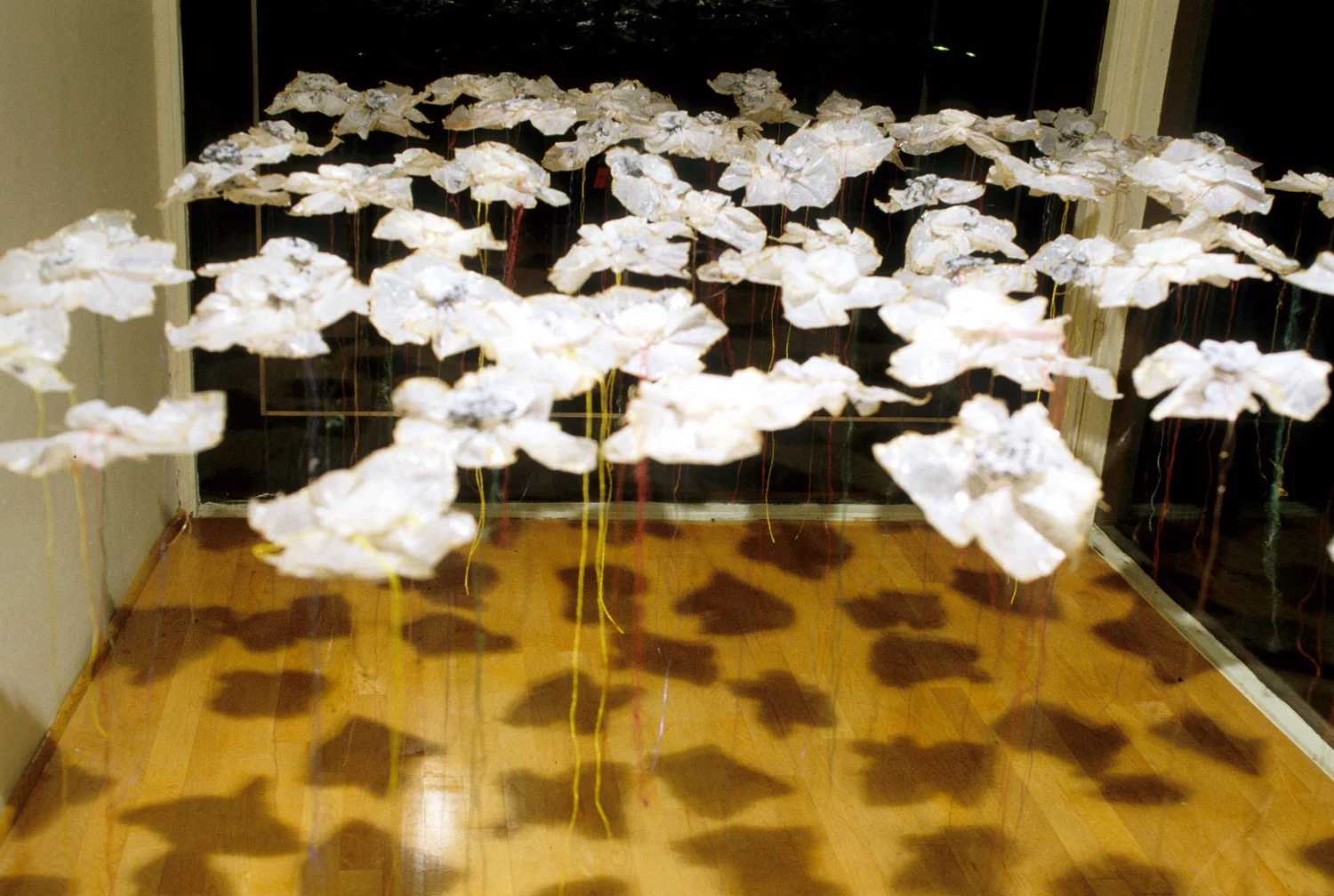 1996, 7’x7’x11, Installation: wish paper, string, acrylic medium