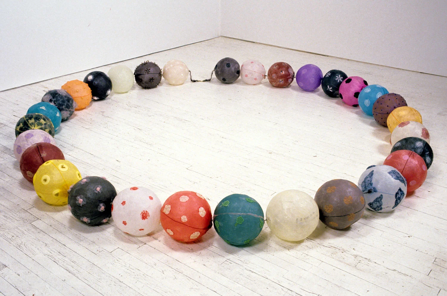 1997, 10'x10'x1', Installation: wish paper, fabric, nylon, feather, lace, beans, rice, metal, plastic, hair wax, etc.