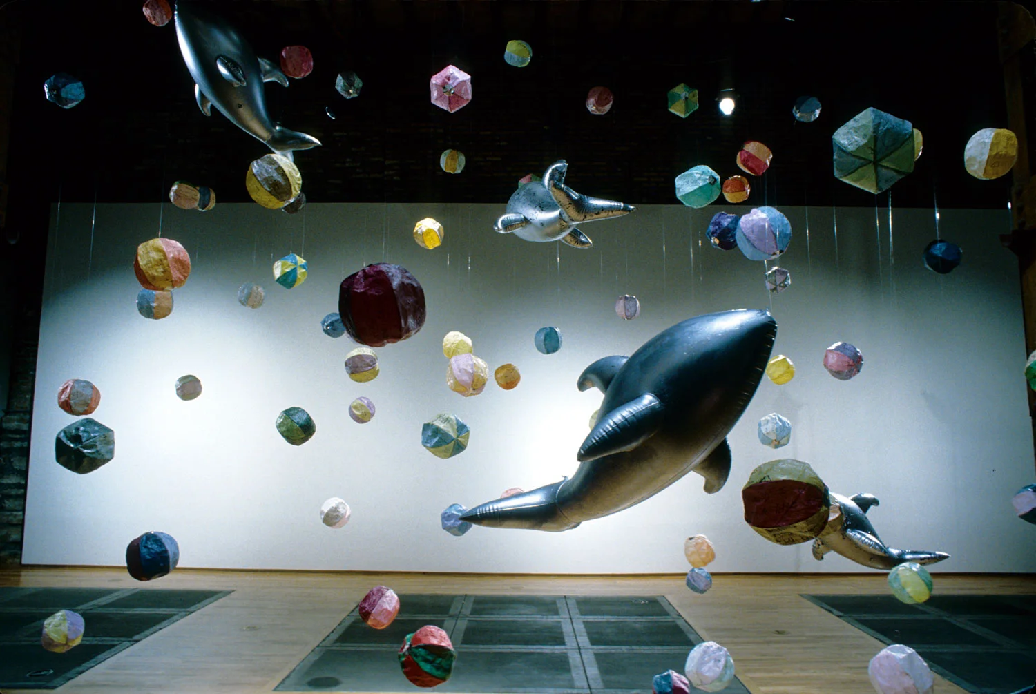 Wish Balls I, 1998, 18’x19’x22’, Installation: wish paper, acrylic medium, thread, inflatable dolphins