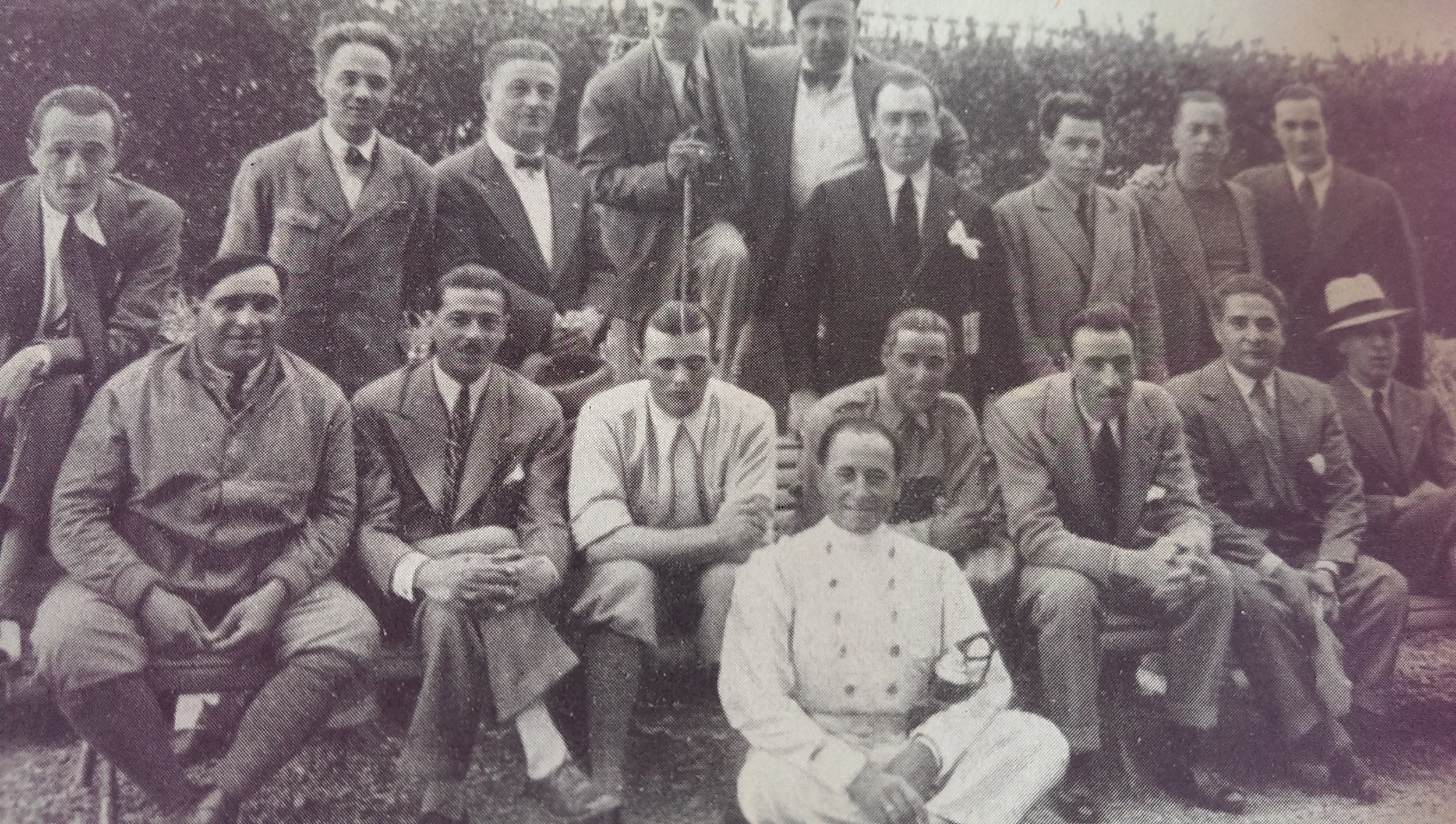 THE LIKELY LADS: VARZI, NUVOLARI, ALFA CONSIGLIERE GIOVANNINI, CONTE BRIVIO, ARCANGELI, CAMPARI, AND LEGENDARY JOURNALIST IN PRE-WAR MOTOR SPORT, GIOVANNI CANESTRINI
