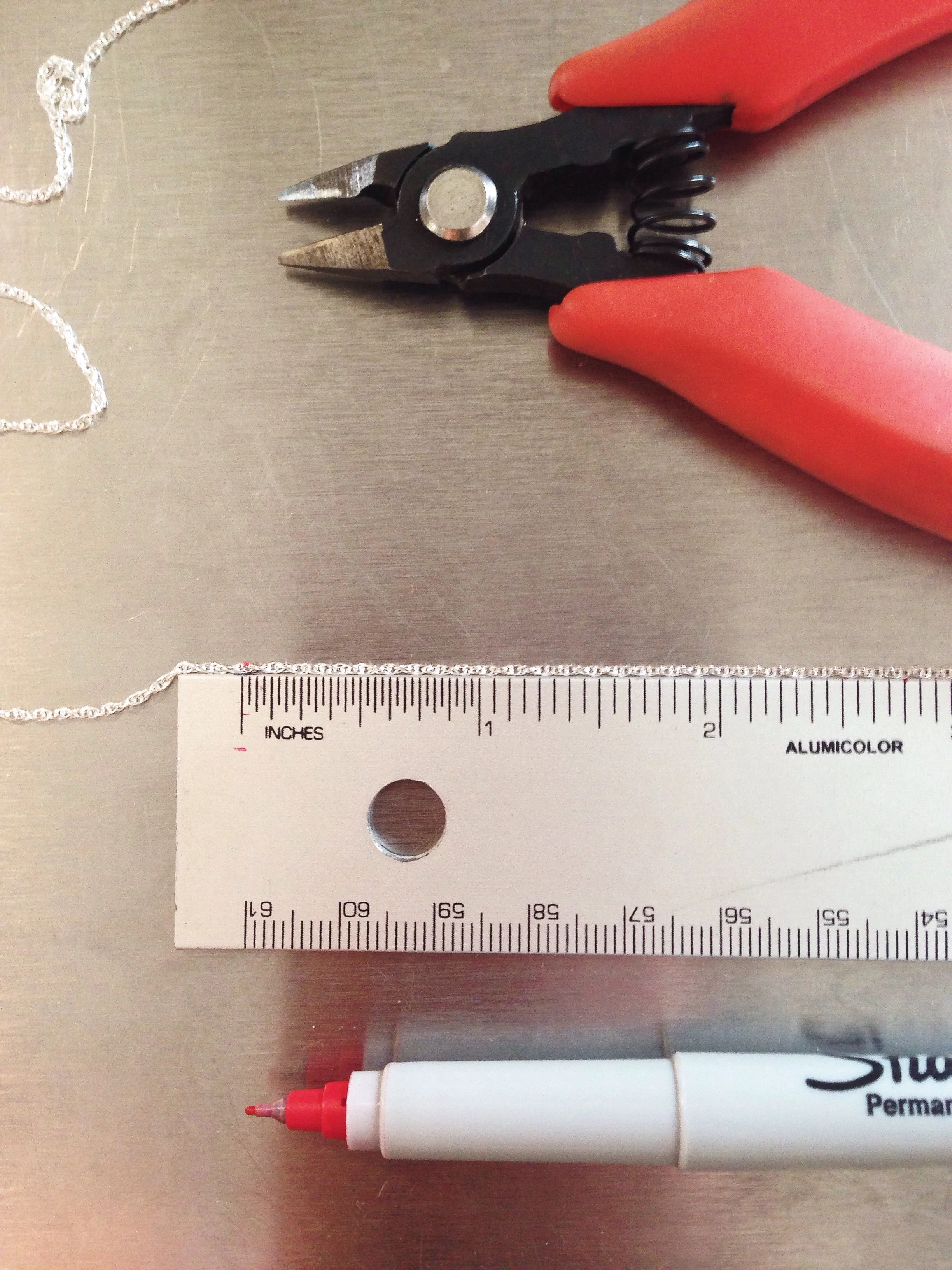 60 feet of chain cut by hand.