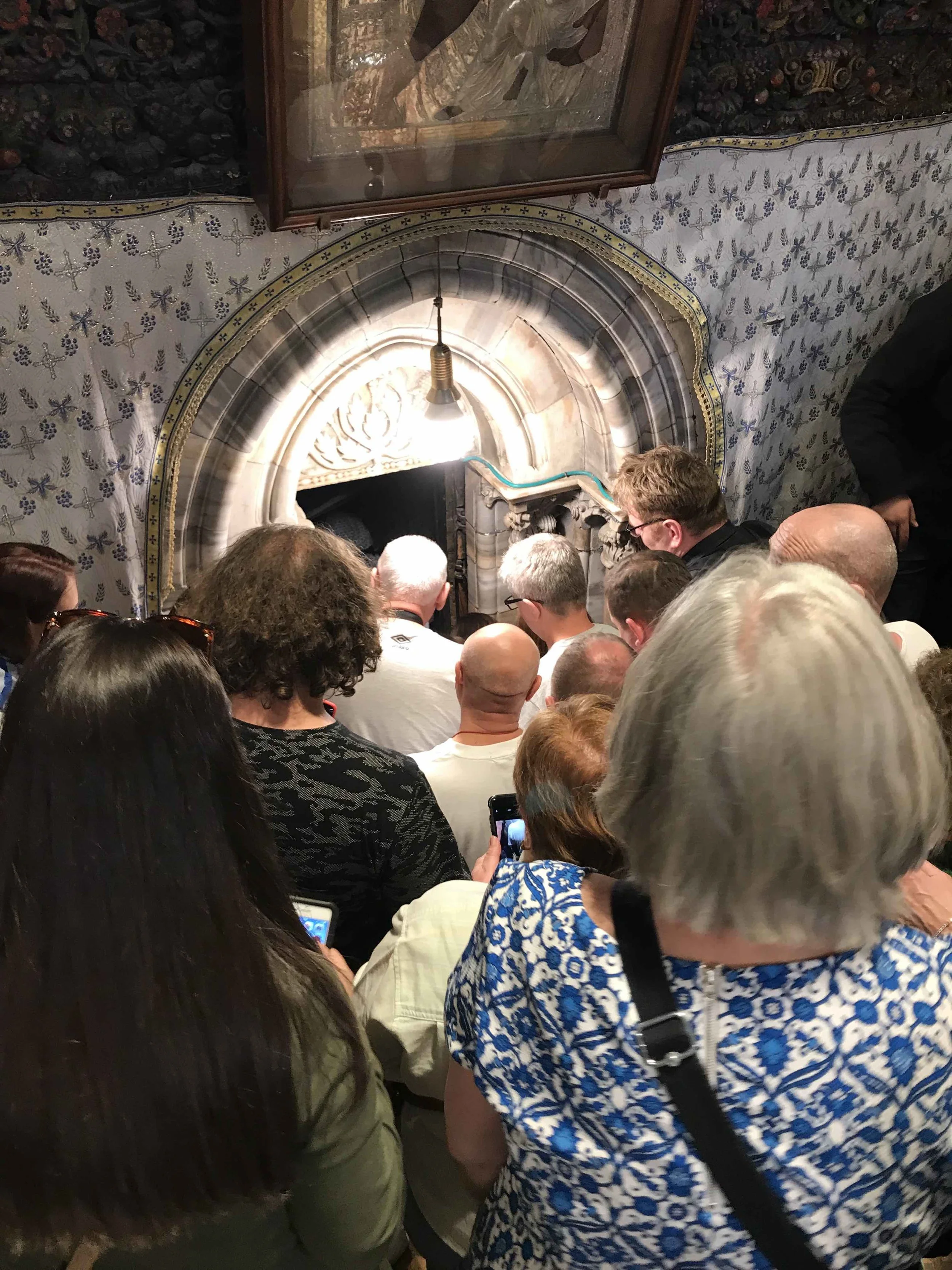 The line down the steps to the underground cave where Jesus was born.