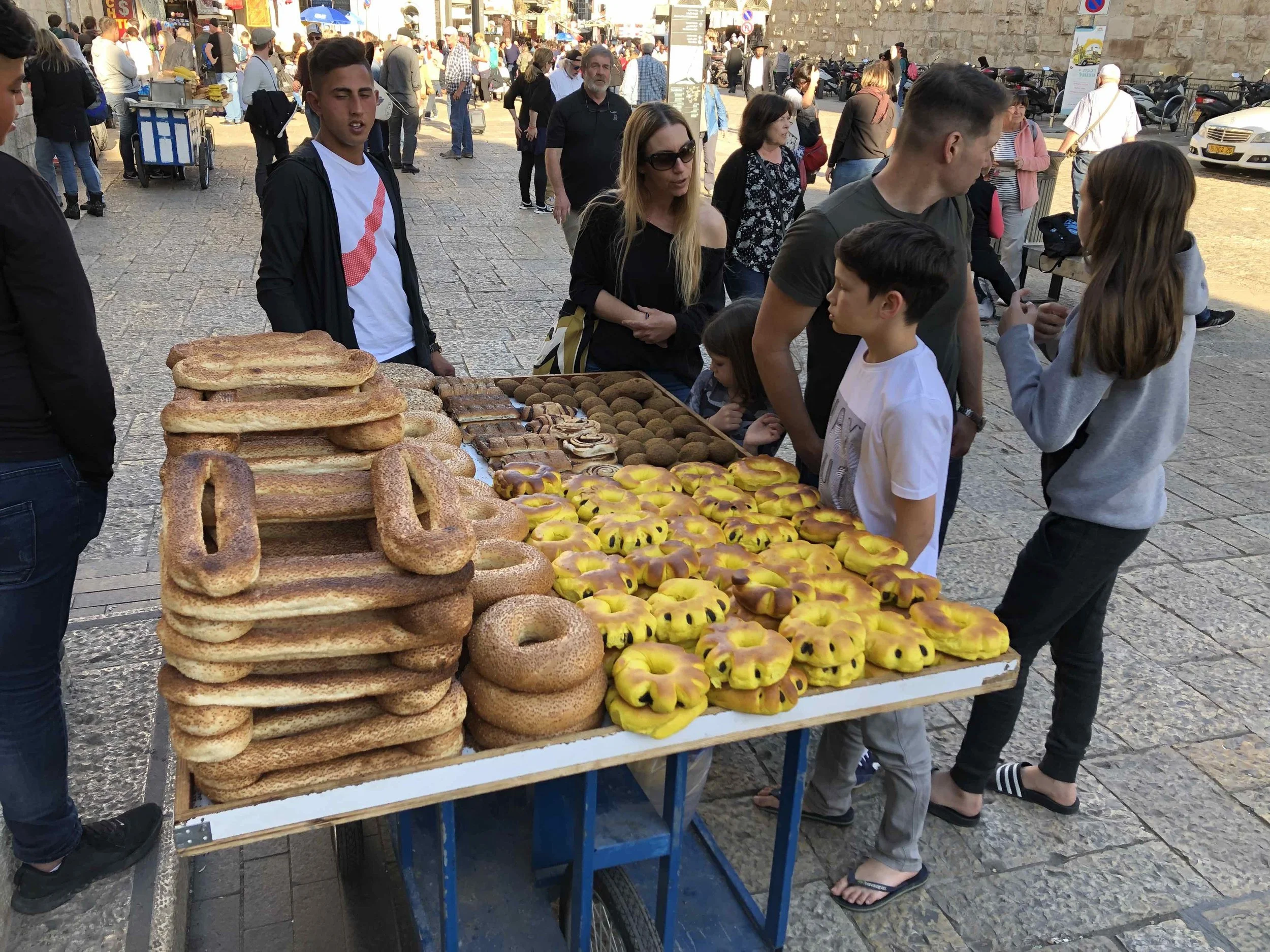 Bartering for beautiful bread in historic Jerusalem.