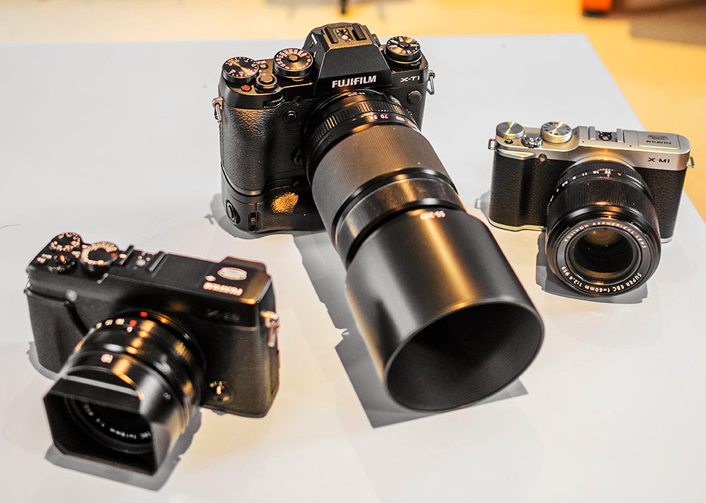 Fuji X-T1 + battery grip, Fuji X-M1 and Fuji X-E2 and 18mm f/2 lens.