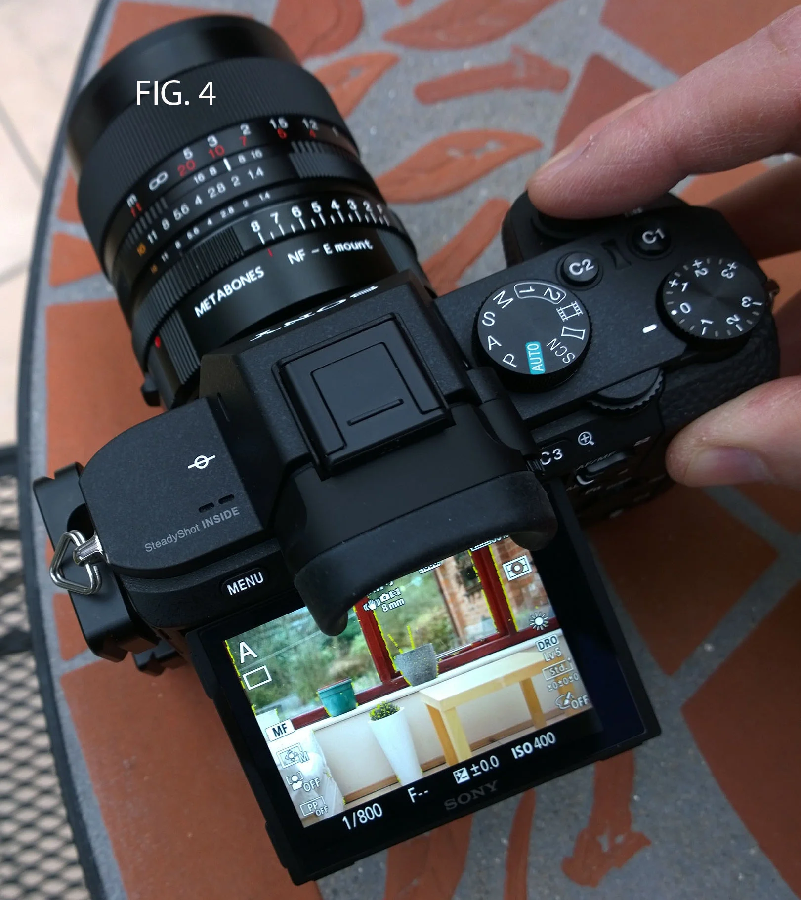 FIG. 4 - Just lightly touching the shutter button returns the screen / EVF to full size and I take the picture.