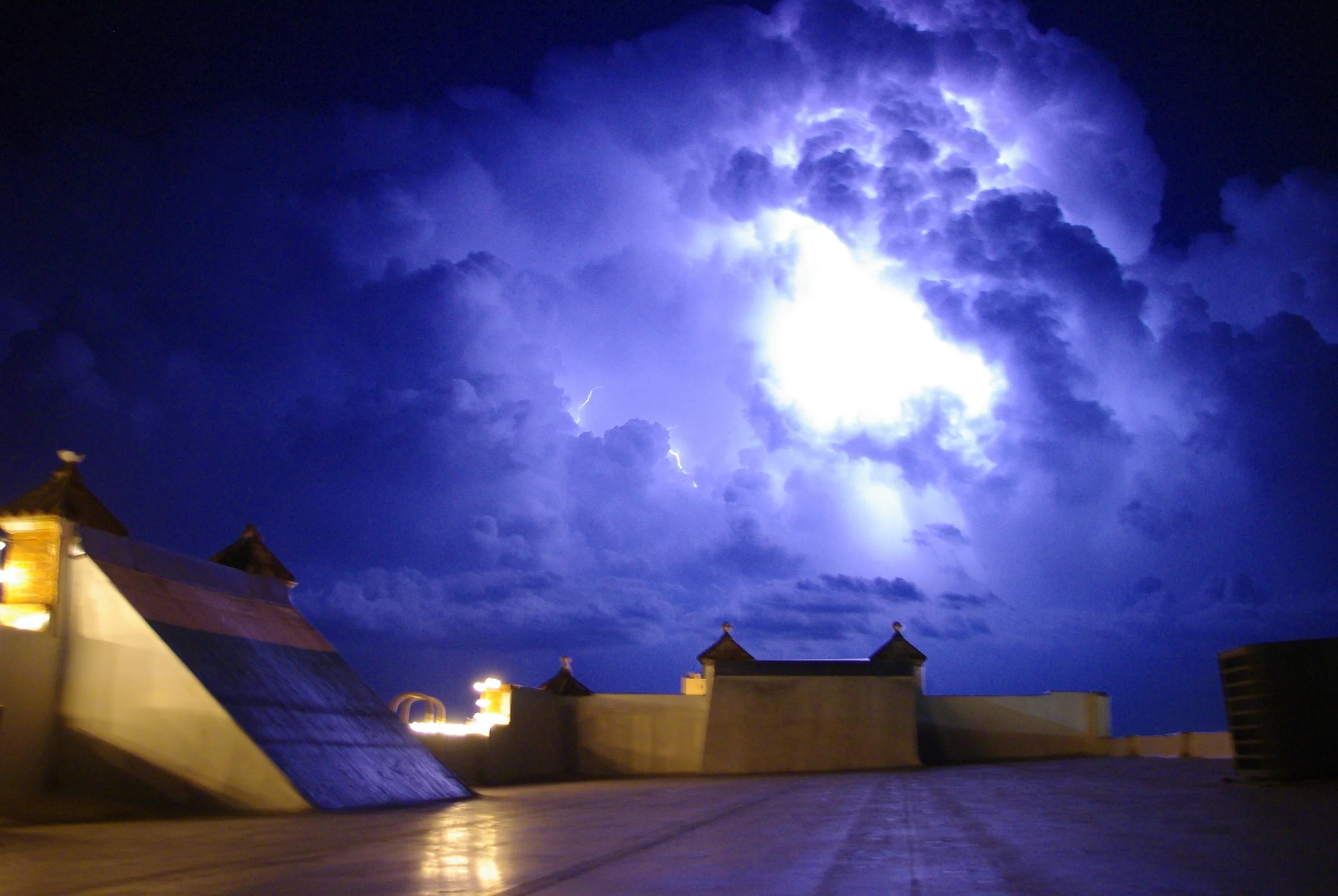Edmund Eva captured a recent lightning storm from the 100W rooftop