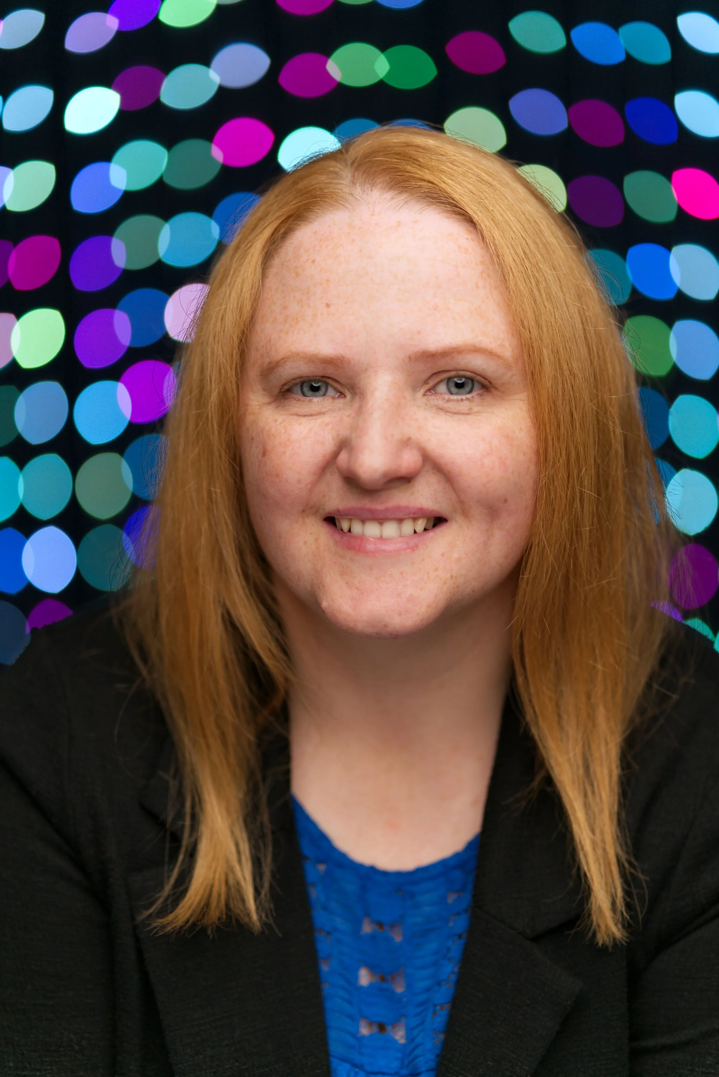 Arlene Bokeh headshot.jpg