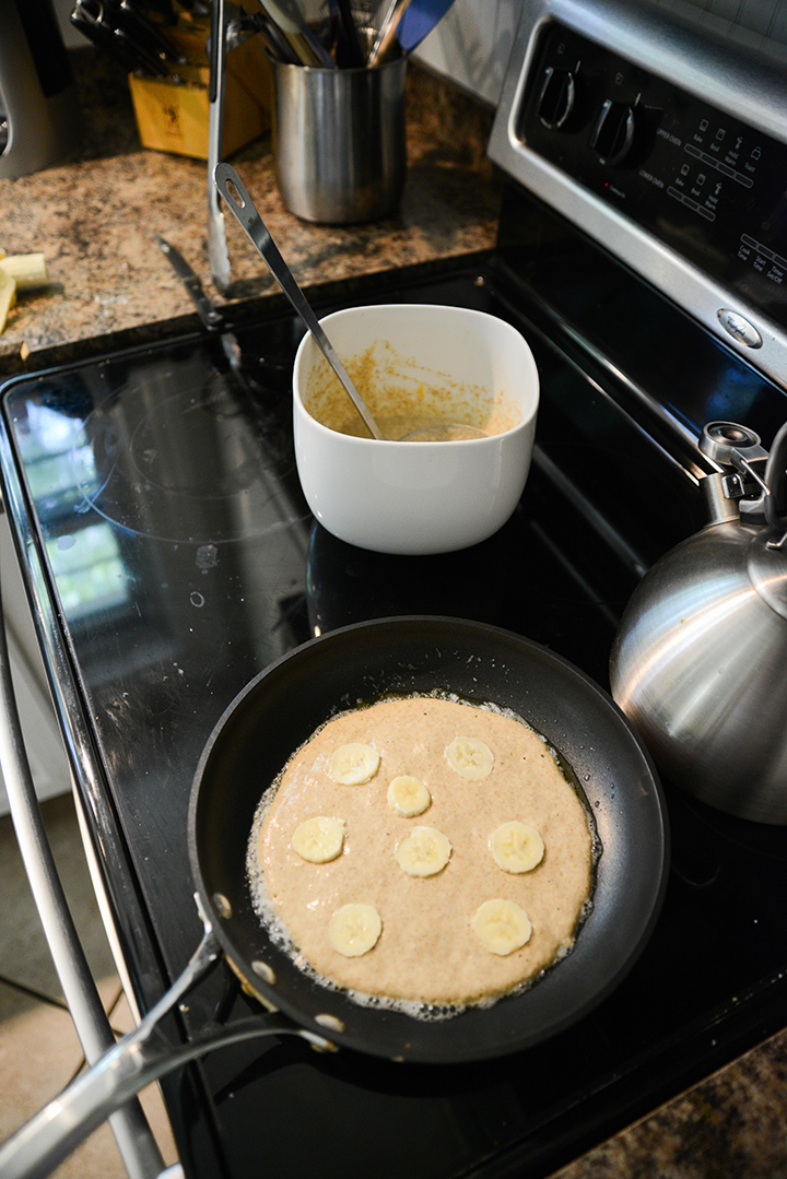 Making banana pancakes.
