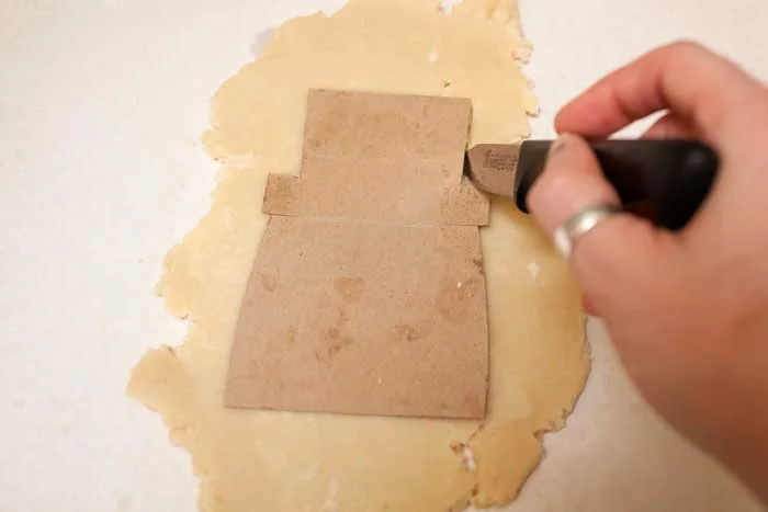 Hand cutting Uncle Sam.