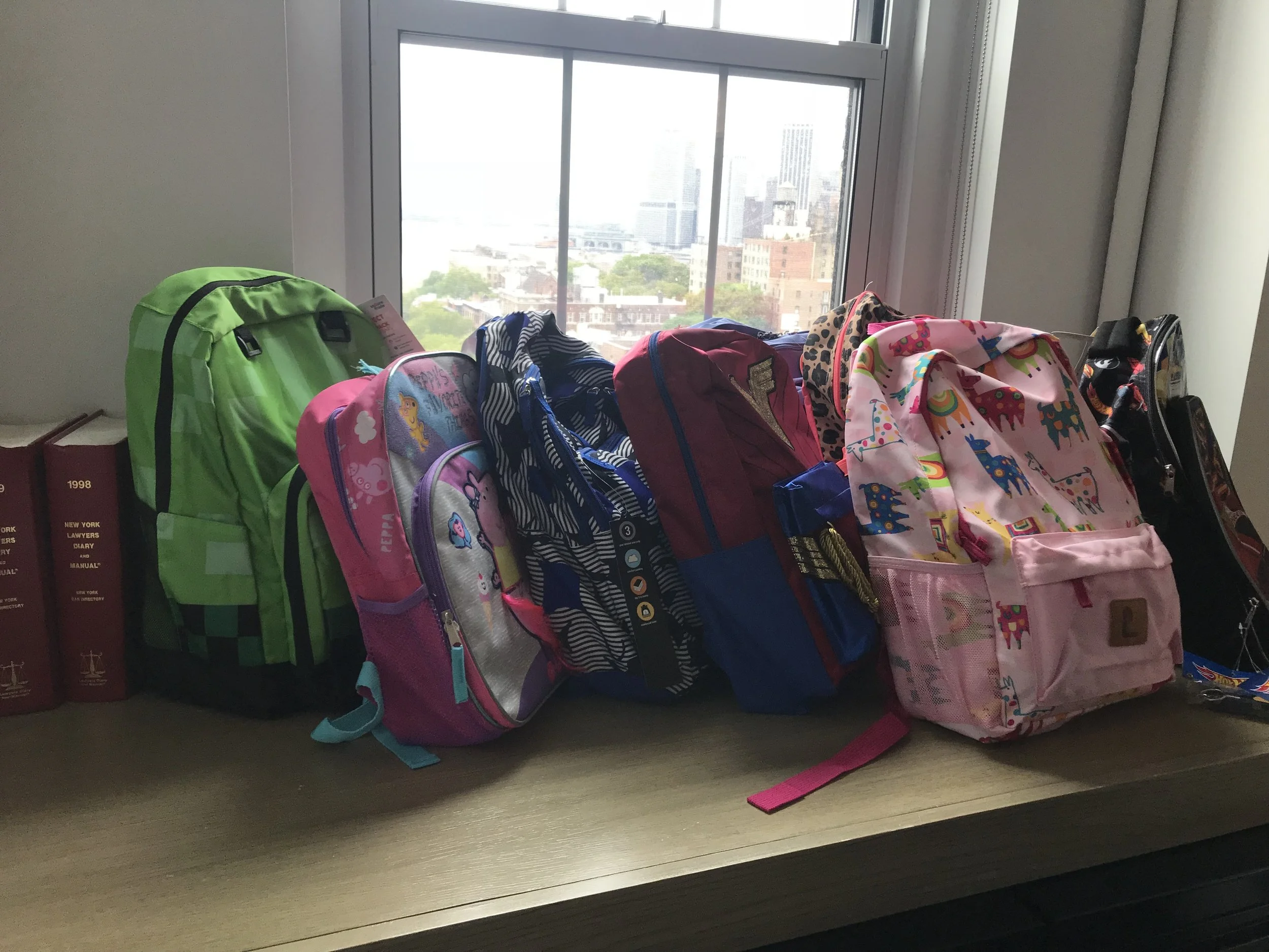 Image: Brand new c hildren's backpacks stuffed with school supplies.