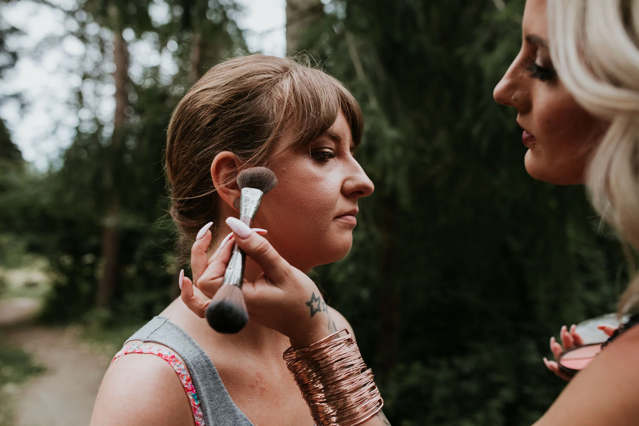 makeup artist applying makeup - getting ready details for Seattle a