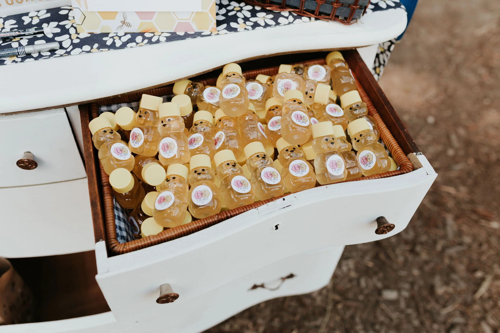 jar of honey with bride and groom initials 