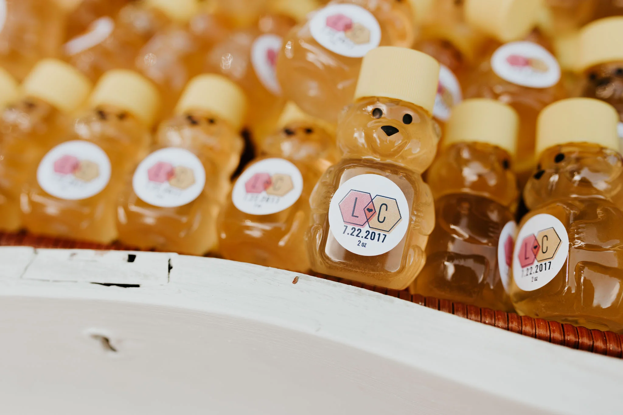 jar of honey with bride and groom initials 