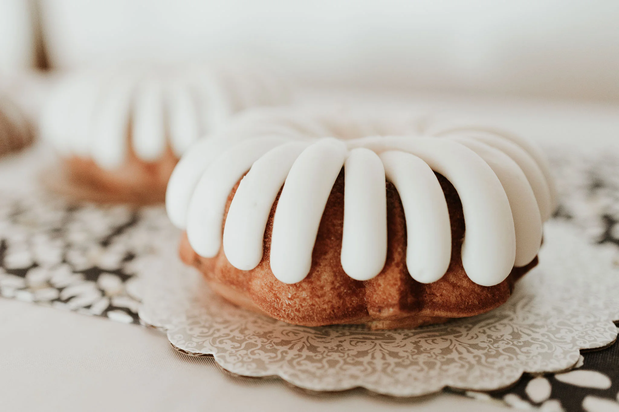 family members bring their own deserts for the reception to share instead of a traditional wedding cake 