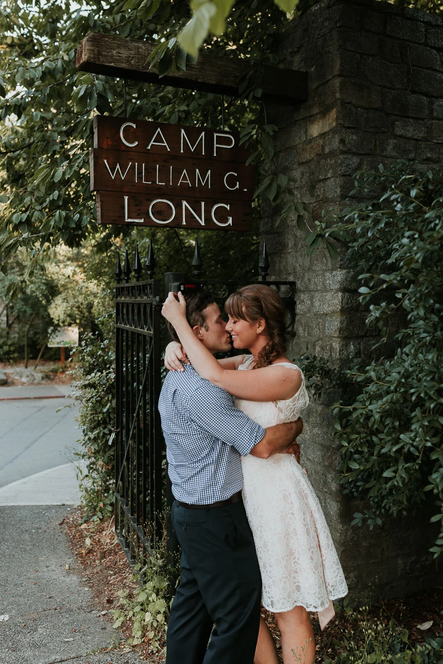 bride and groom step away from the reception to take some some time to them selves 