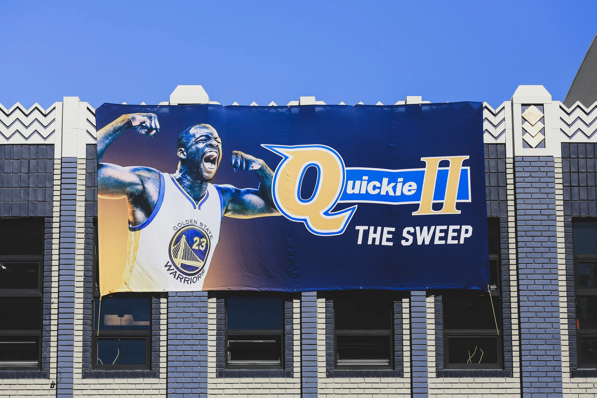 The Warriors were back-to-back champions, and off the heels of the success of our previous banner , my partner and I knew we had to top it somehow. Once again paying homage to Draymond Green, and the Quickie shirt he wore during the 2017 parade, we created a banner we knew he’d appreciate.