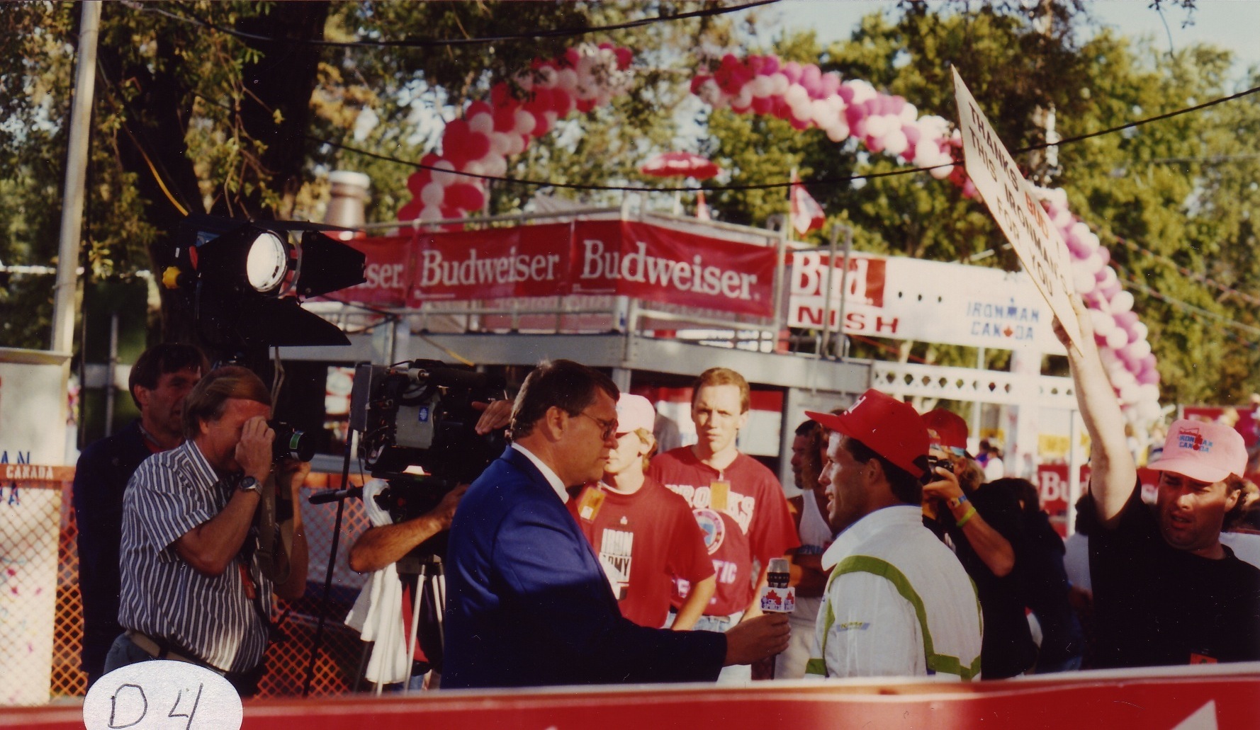 Don Brown behind the camera while a CBC Sports personality interviews Ray Browning