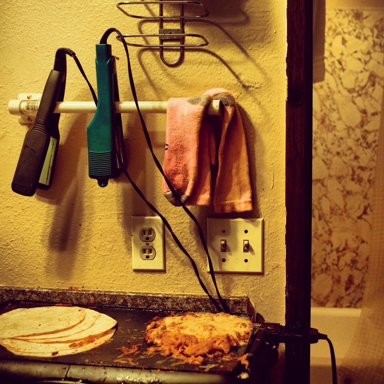 Jane keeps beans and tortillas warm with a skillet she keeps on the bathroom counter. Photo by Tim Matsui.